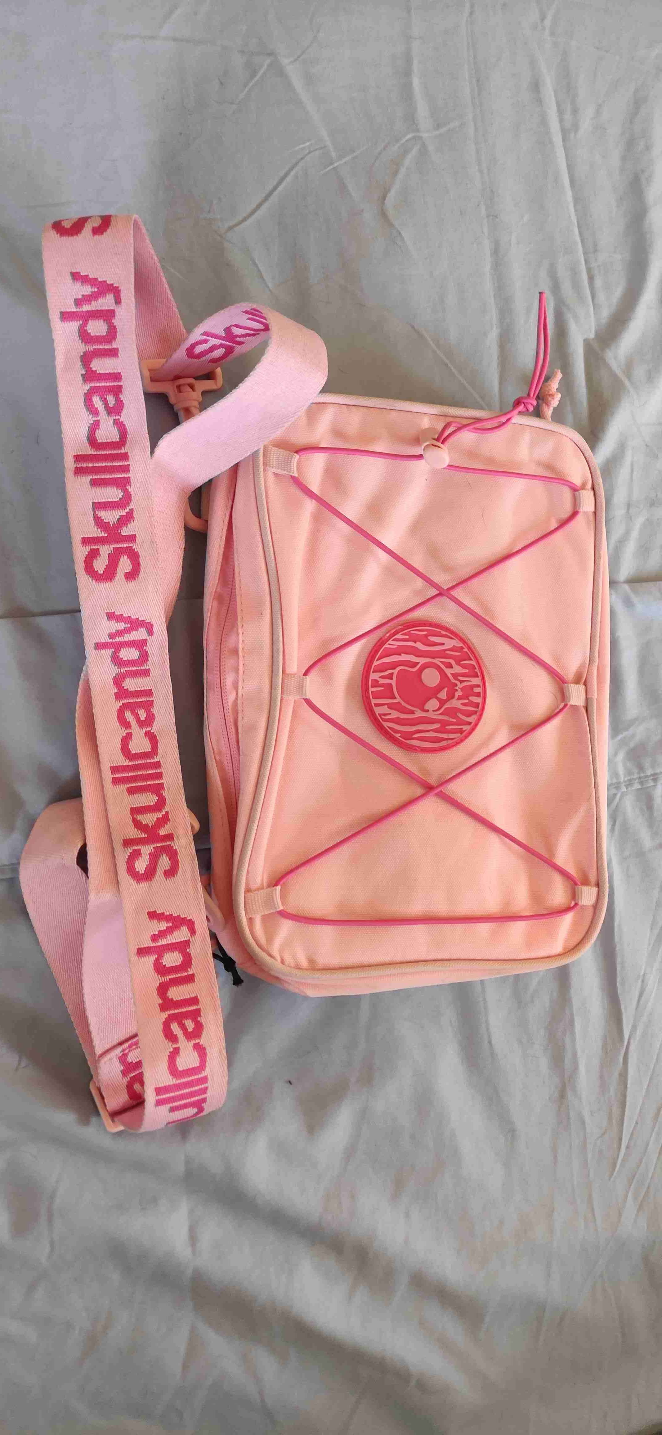 Bandolera rosa Skullcandy