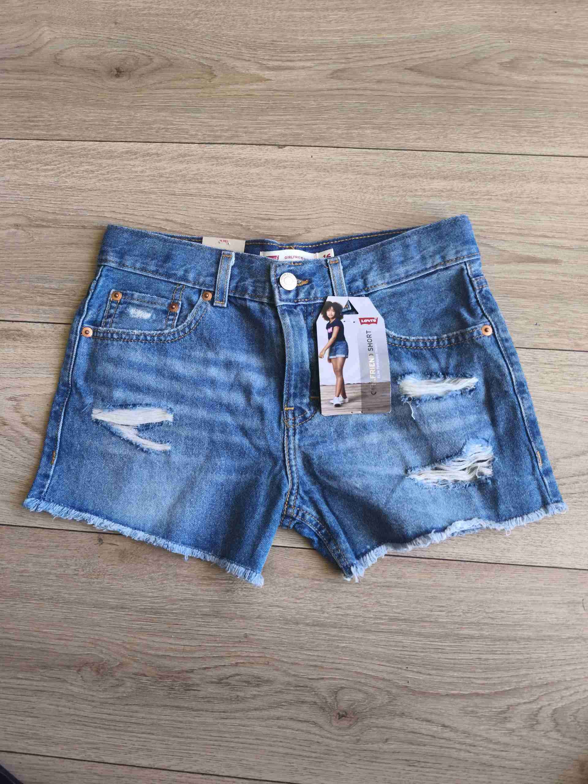 Shorts de mezclilla con desgastes niña t 16