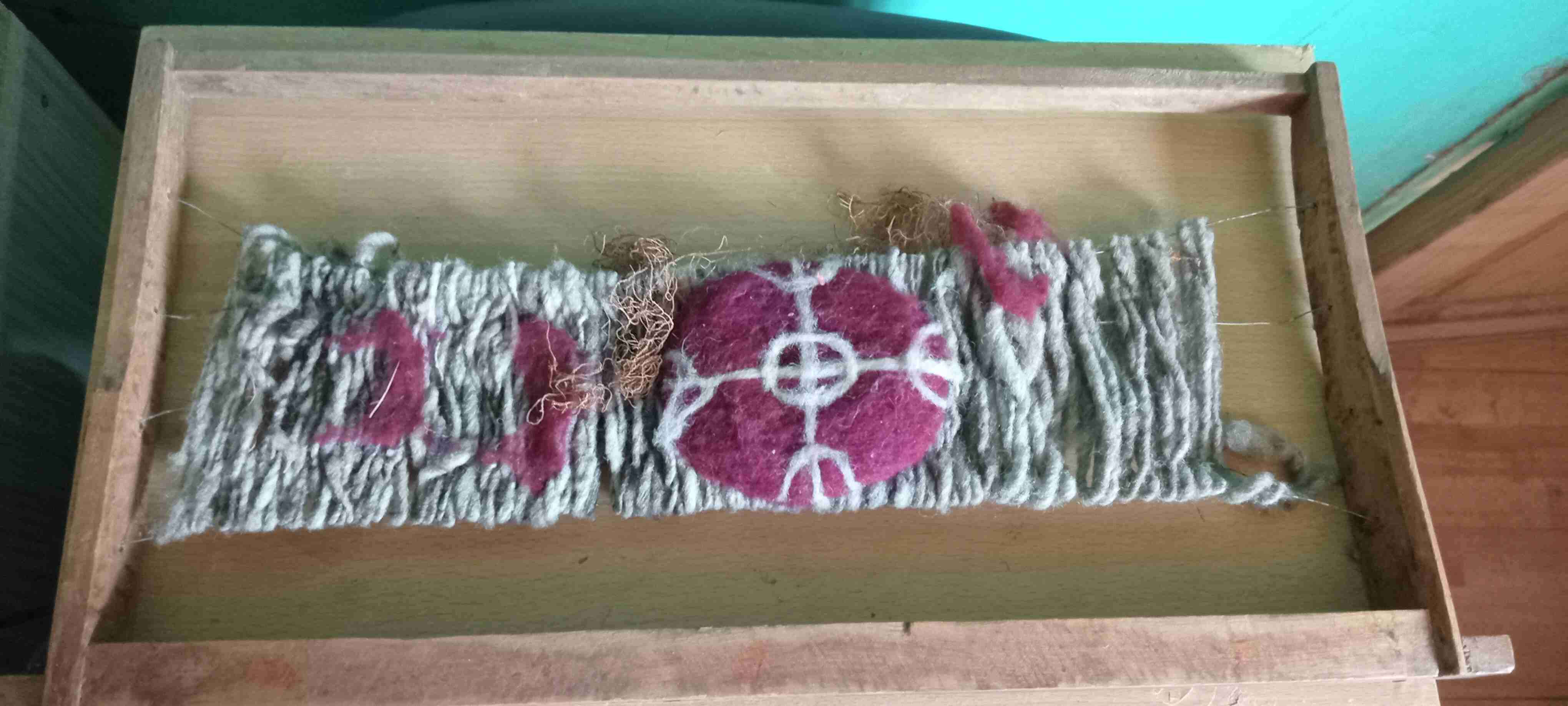 Telar mapuche enmarcada