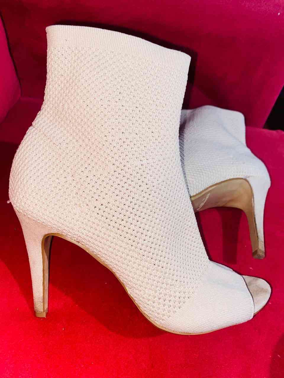 Botines altos color crema