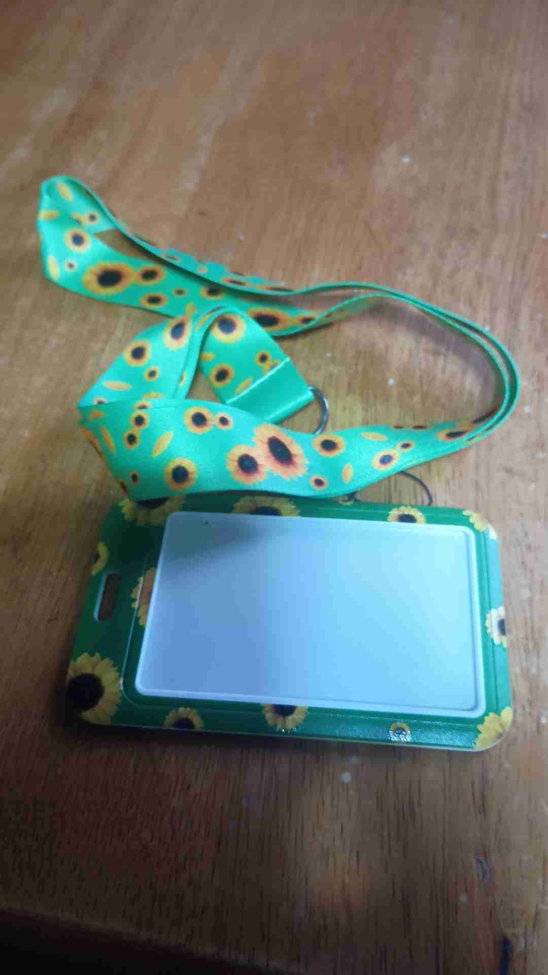 Lanyard verde con girasoles