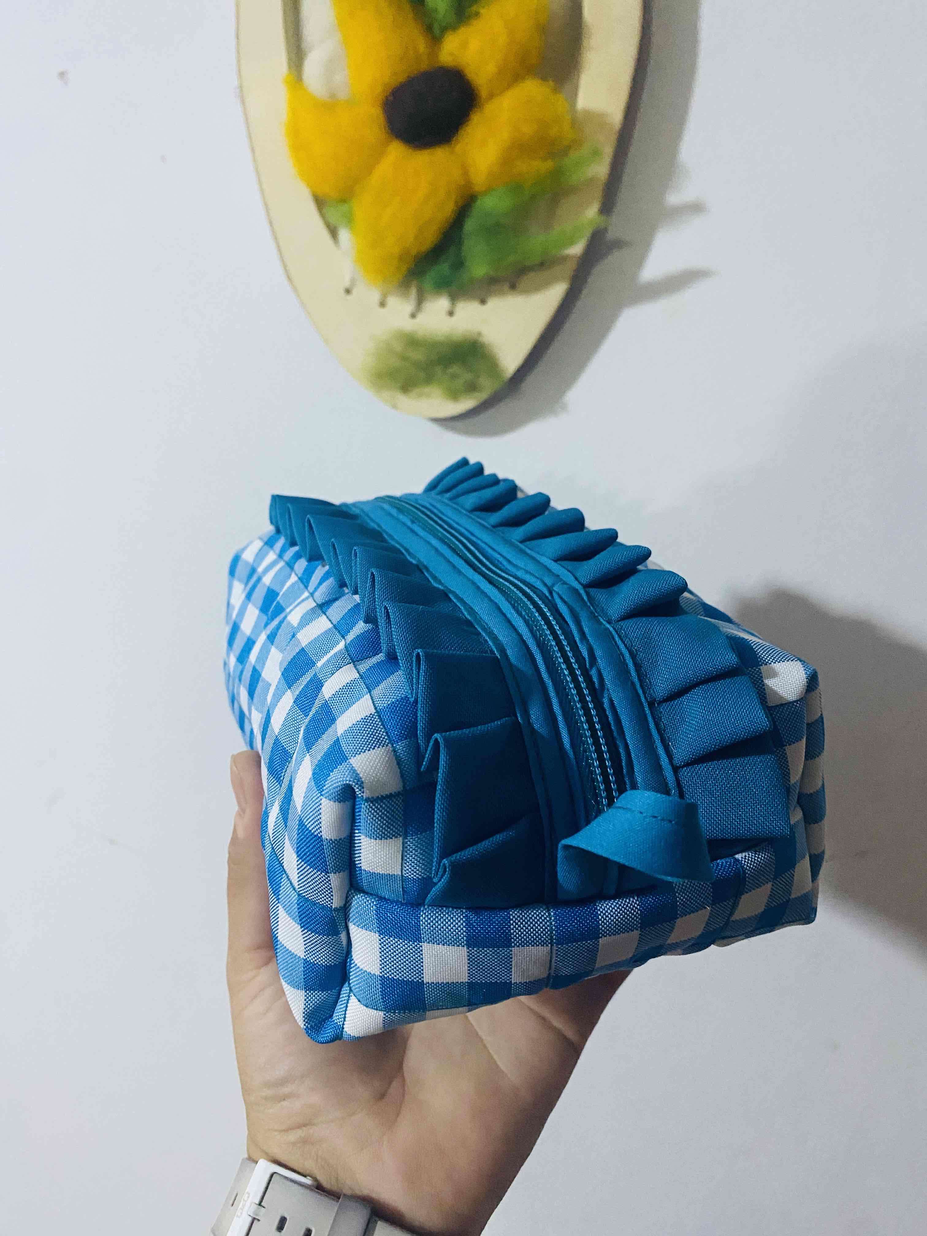 Neceser azul a cuadros