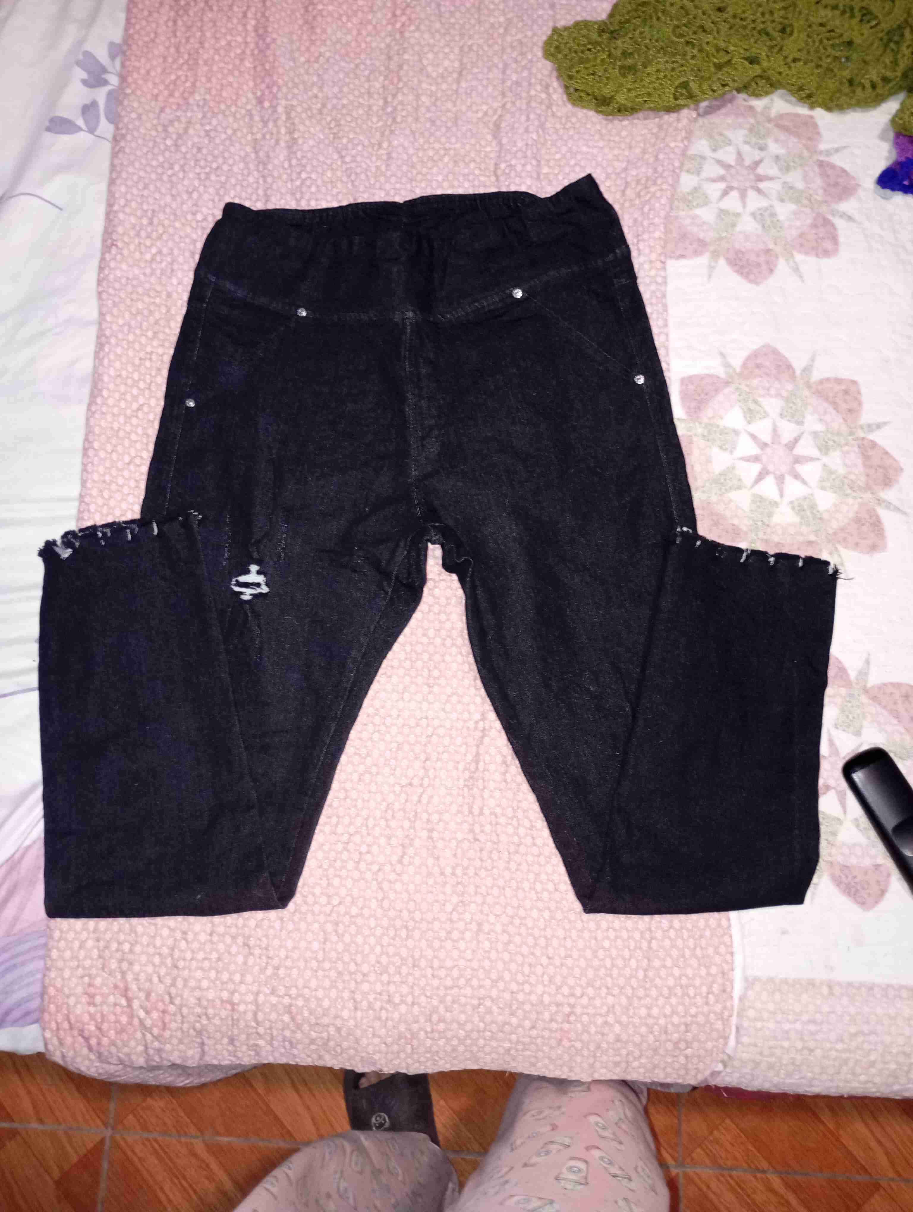 Pantalones de mezclilla rotos