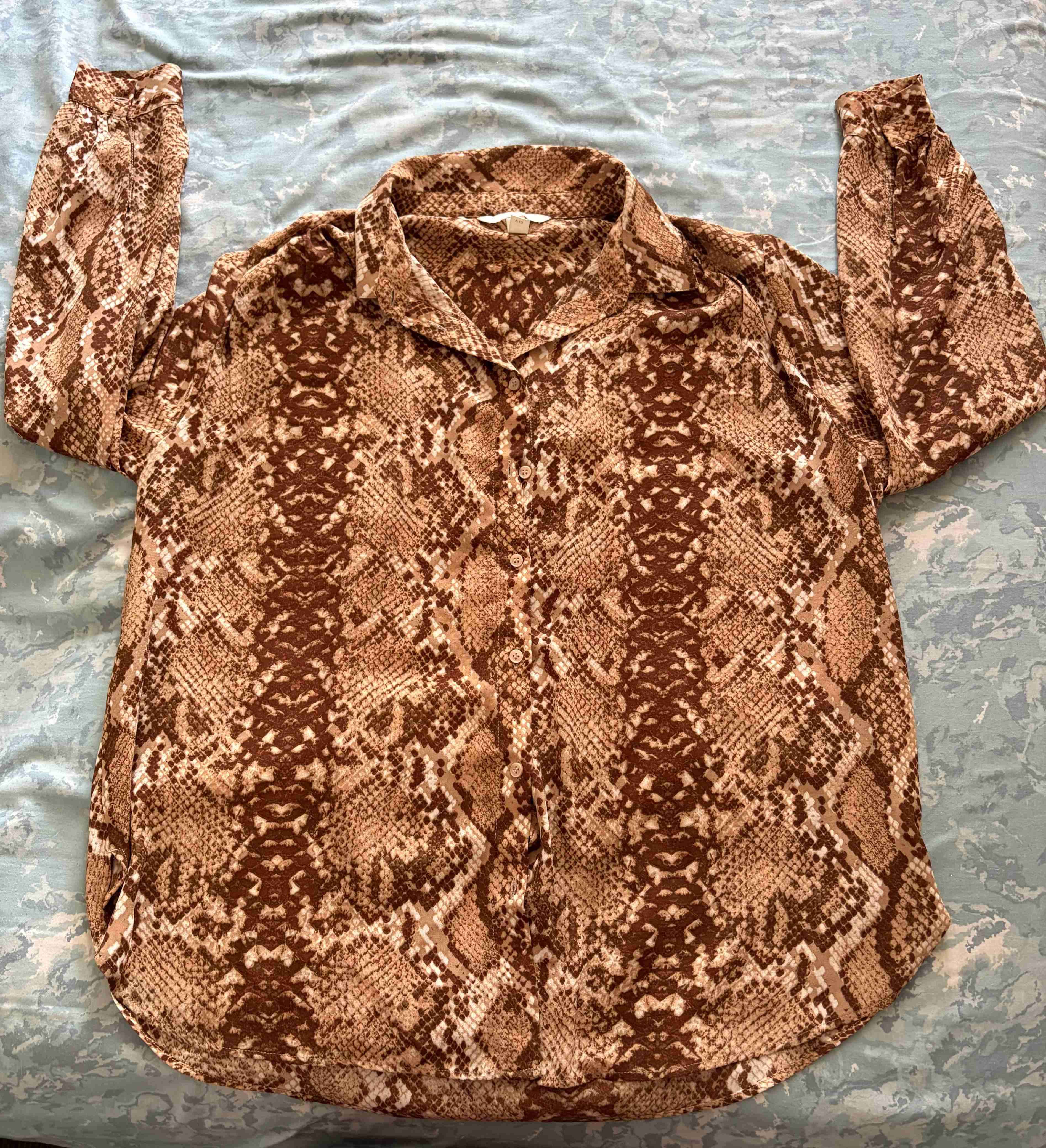 Blusa estampado serpiente