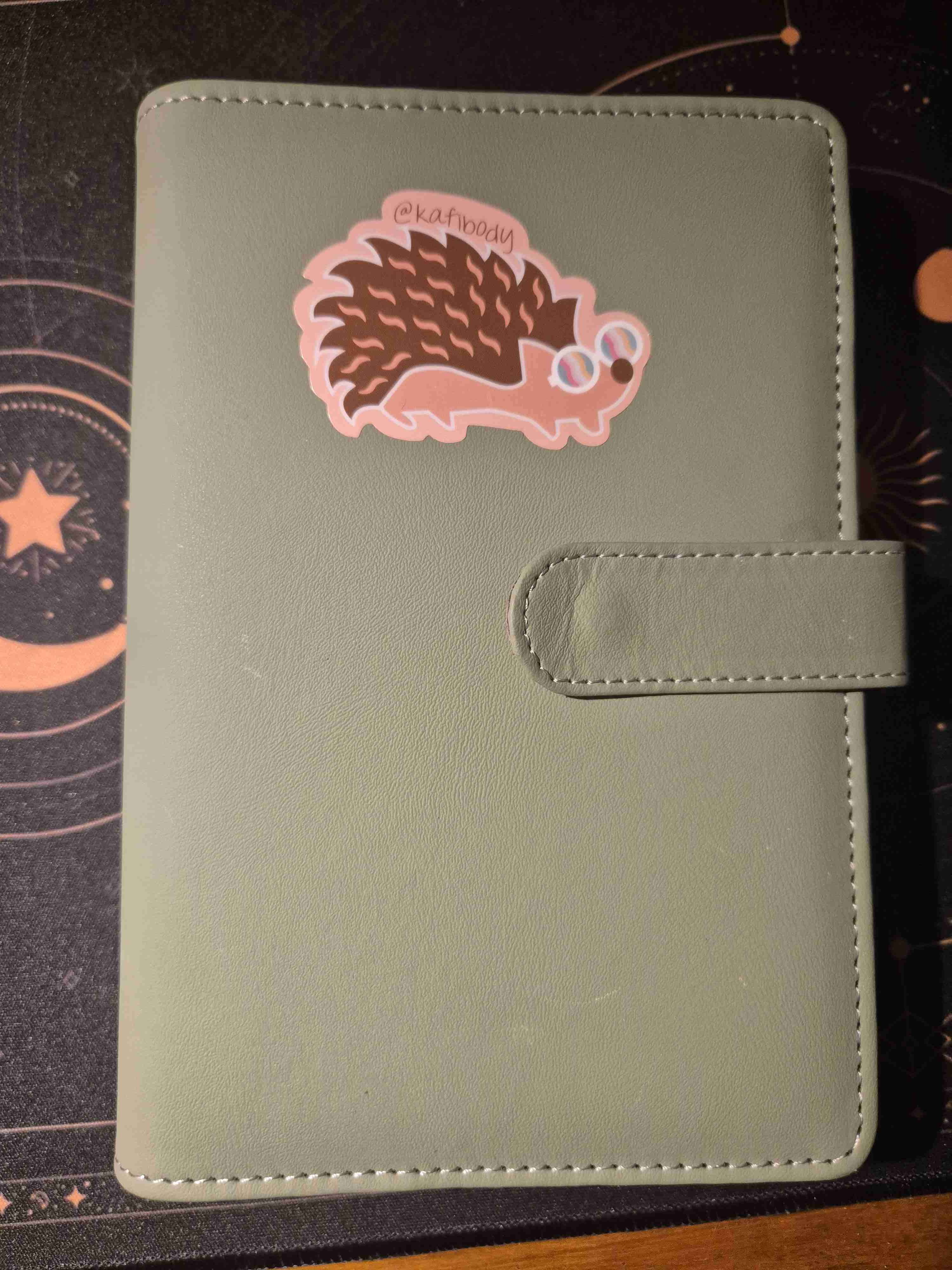 Cuaderno con cubierta verde para ahorro
