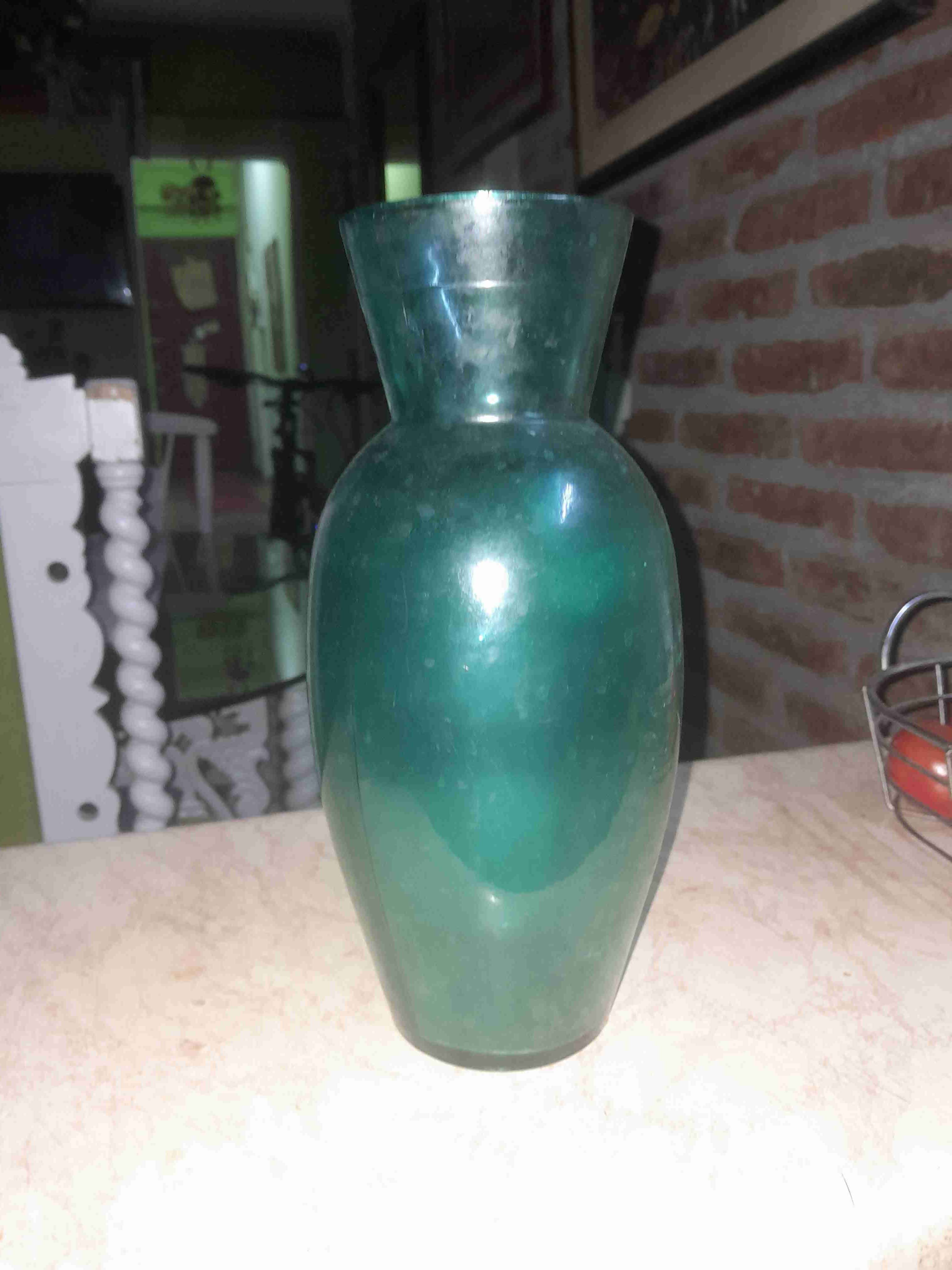 Florero de vidrio verde