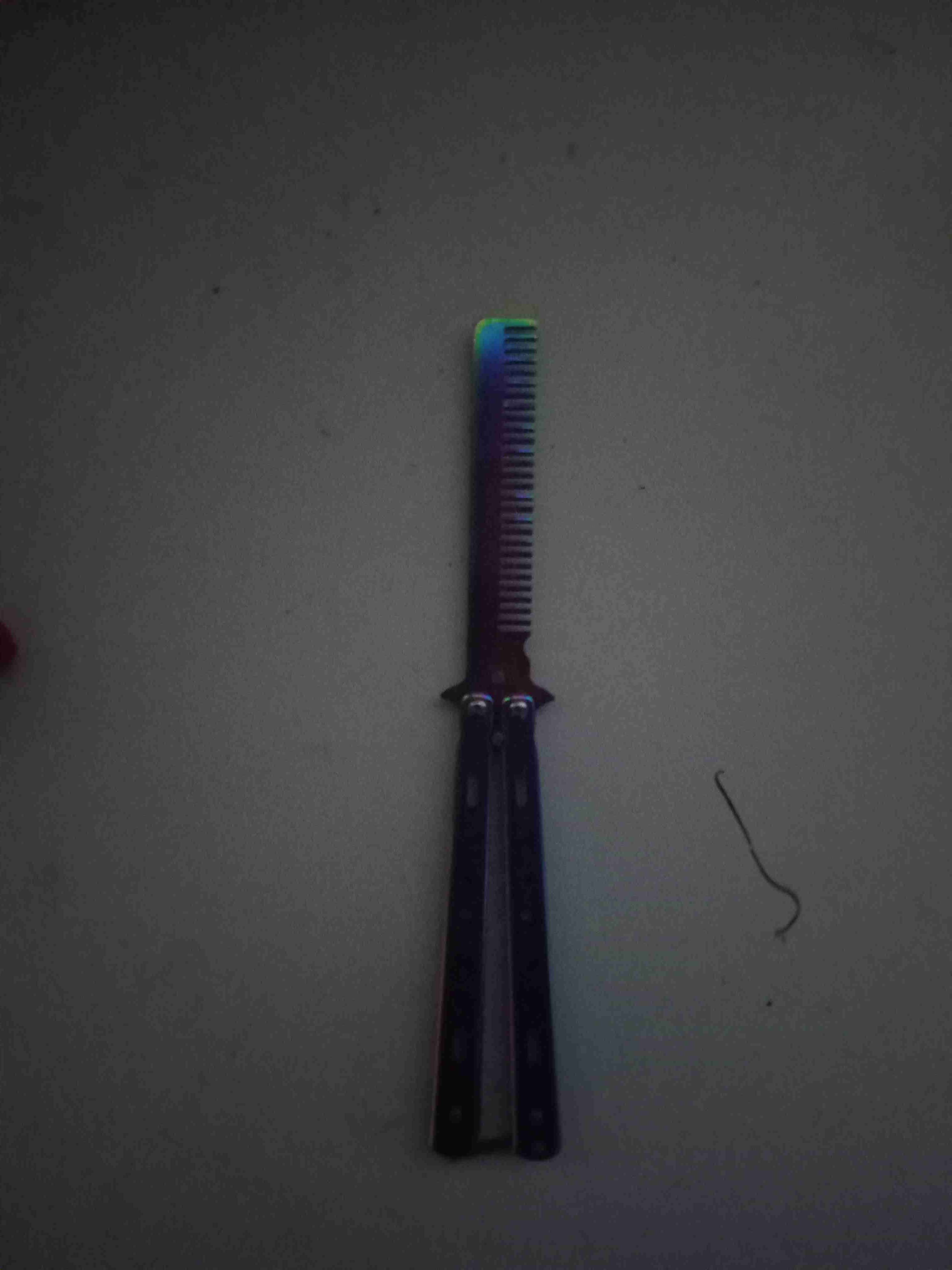 Peine de acero estilo mariposa