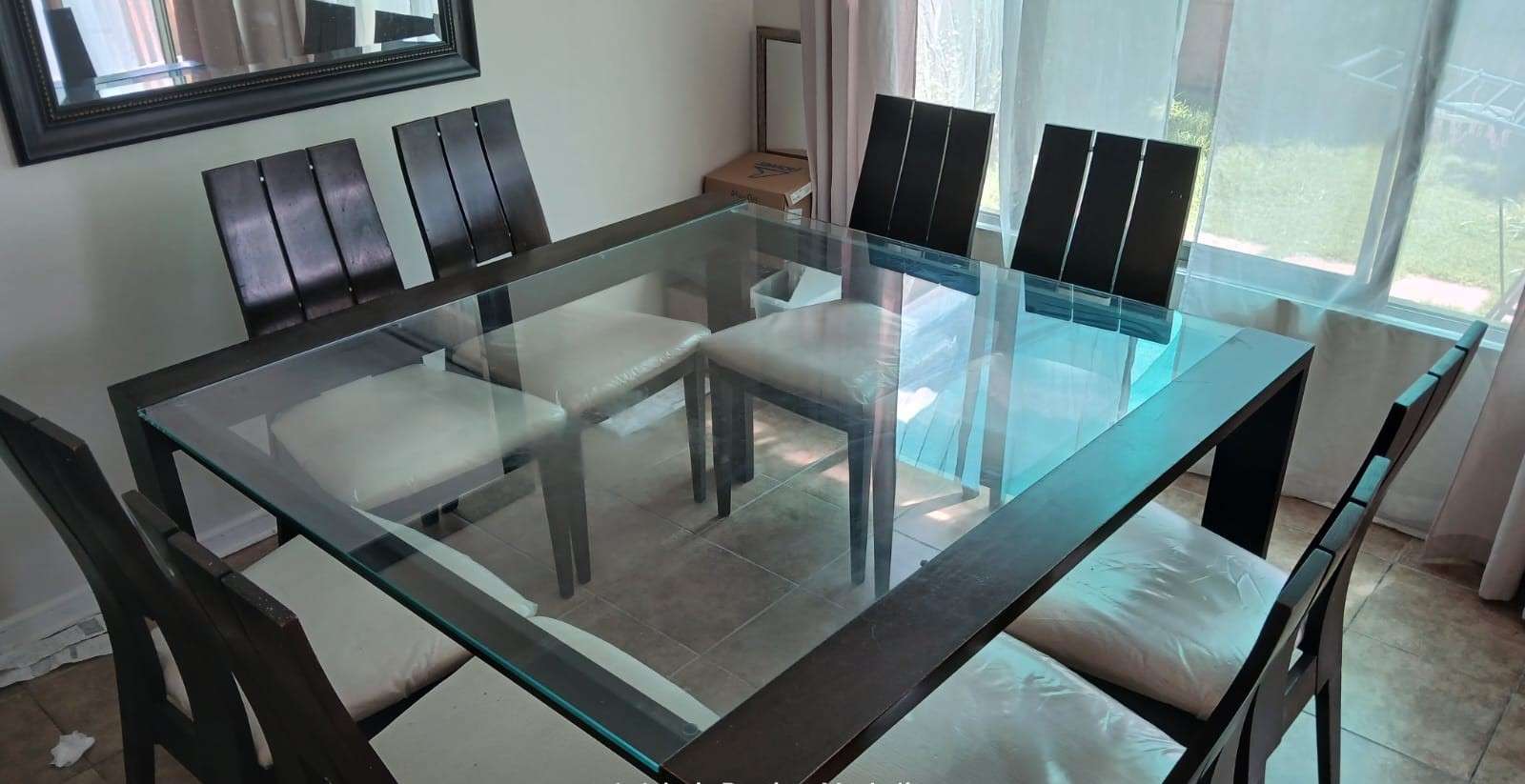 Comedor de vidrio moderno con 8 sillas