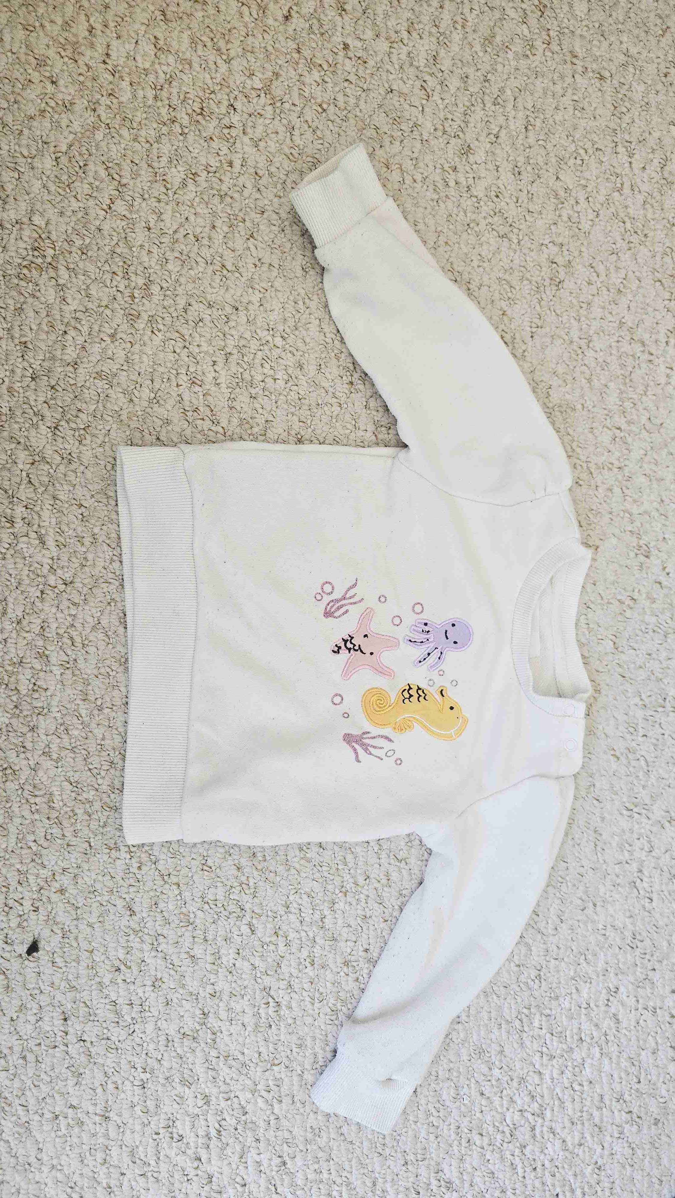 Polerón blanco infantil con dibujos Boulevard