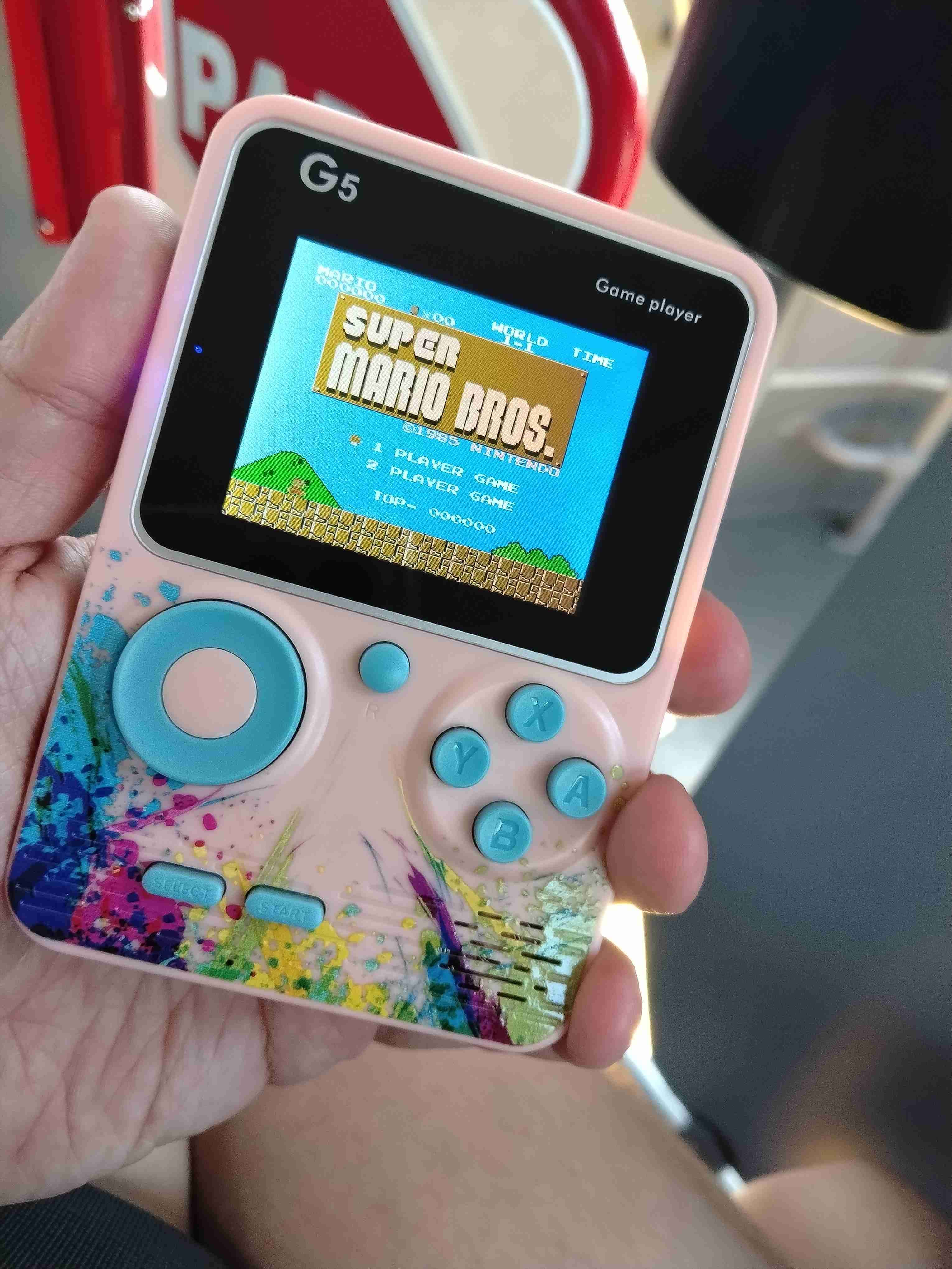 Consola portátil G5 rosa NES 500 juegos retros