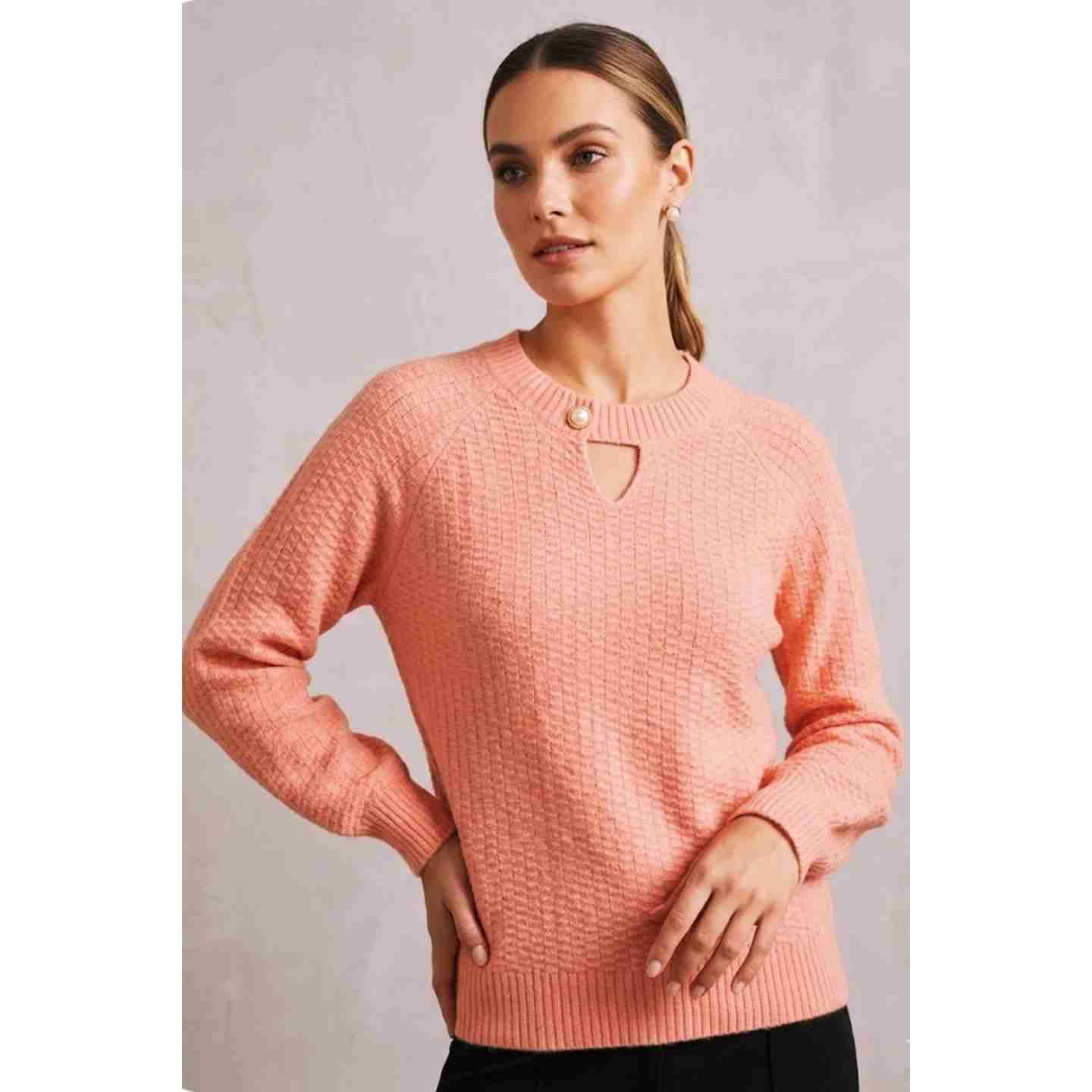 Suéter de punto rosado nuevo