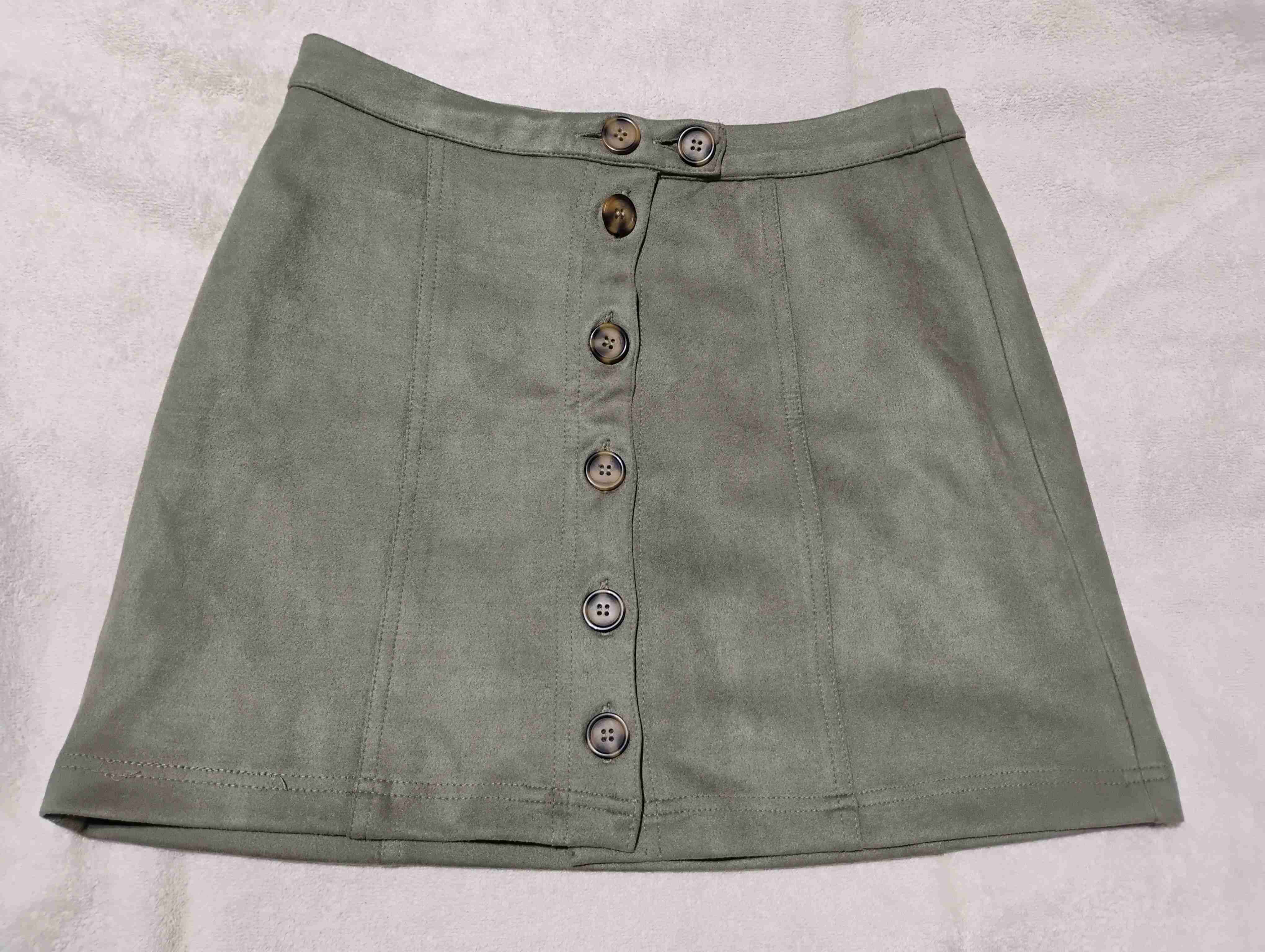 Mini falda verde con botones