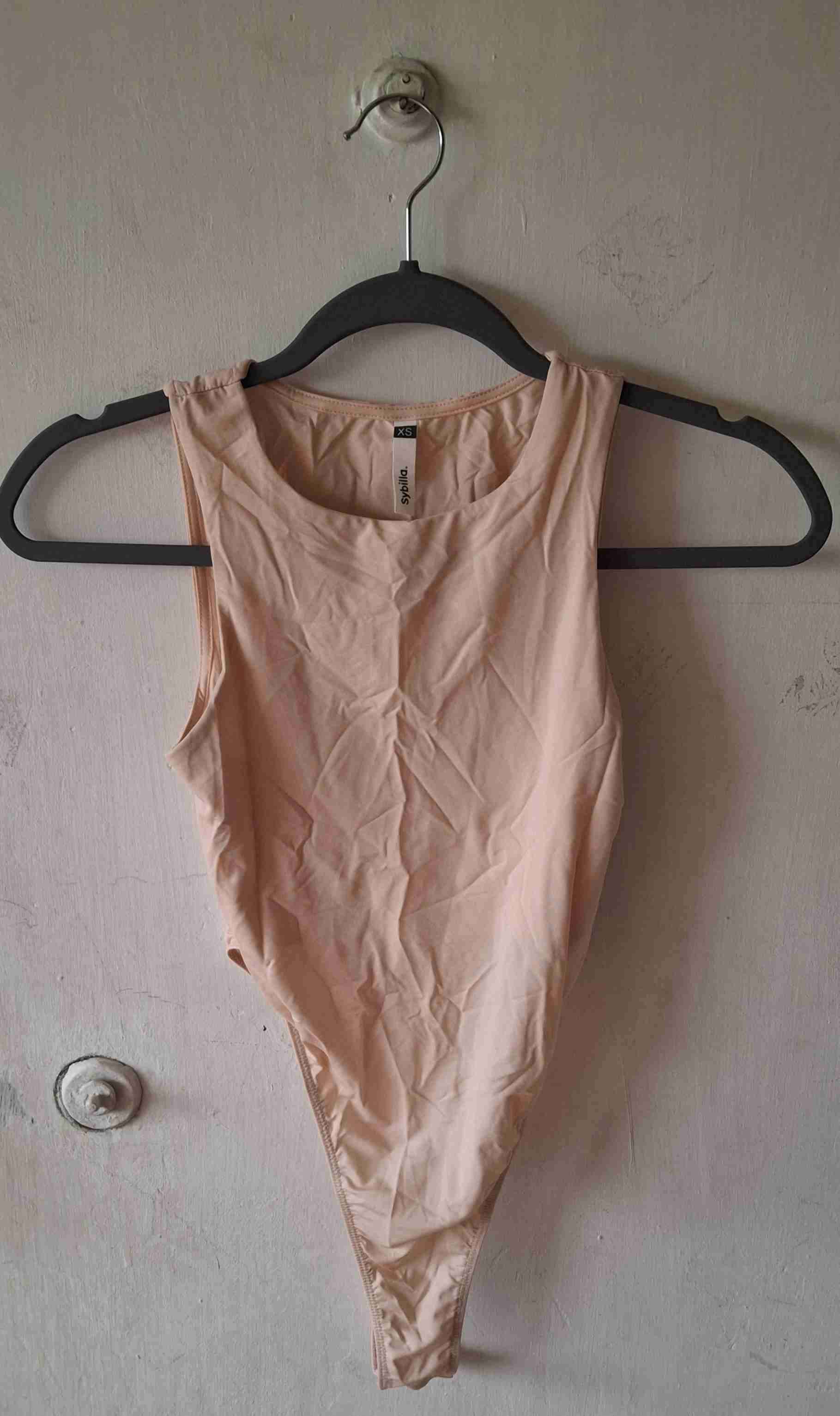 Body color piel  sin mangas XS