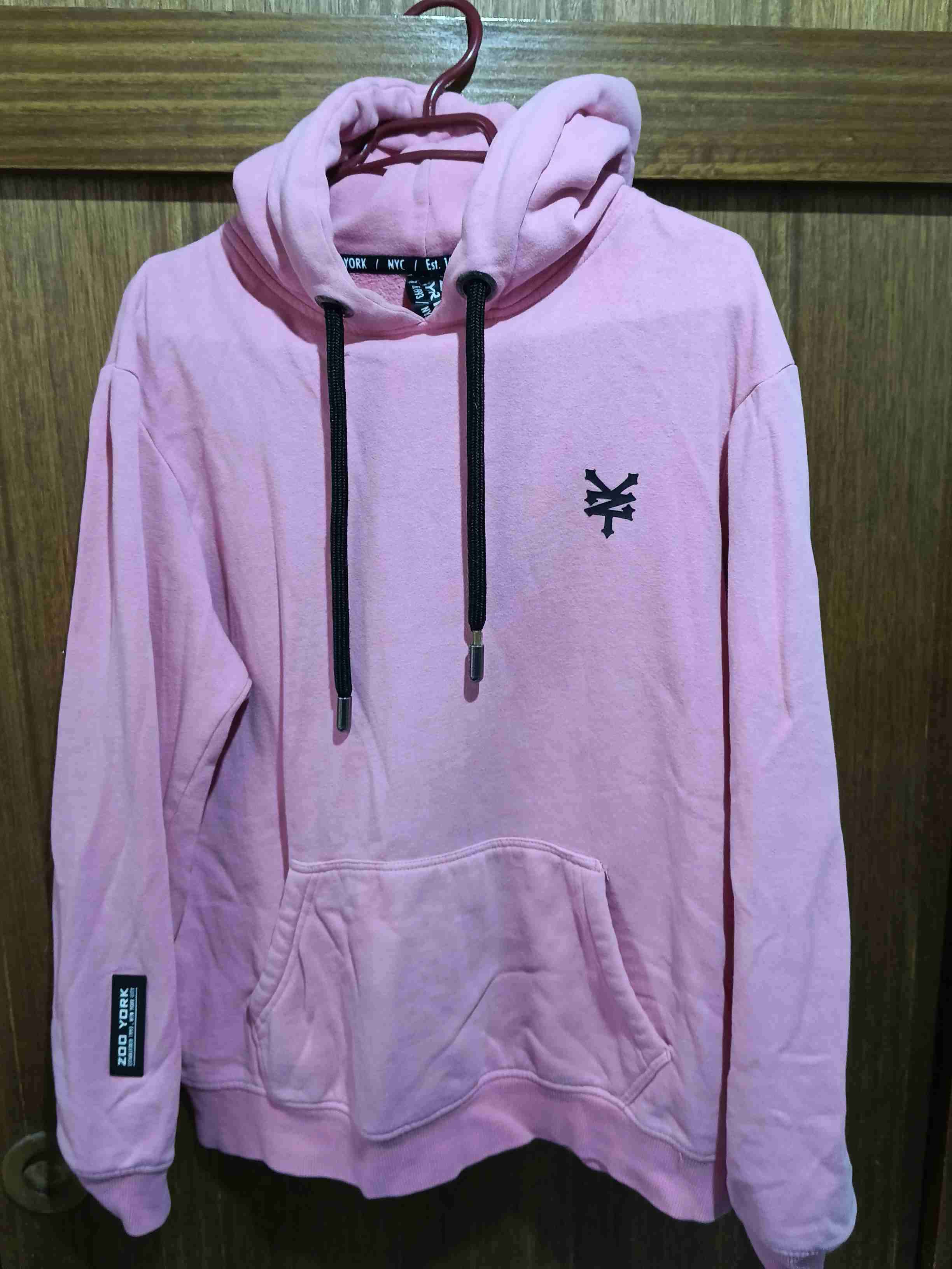 Polerón rosado con capucha