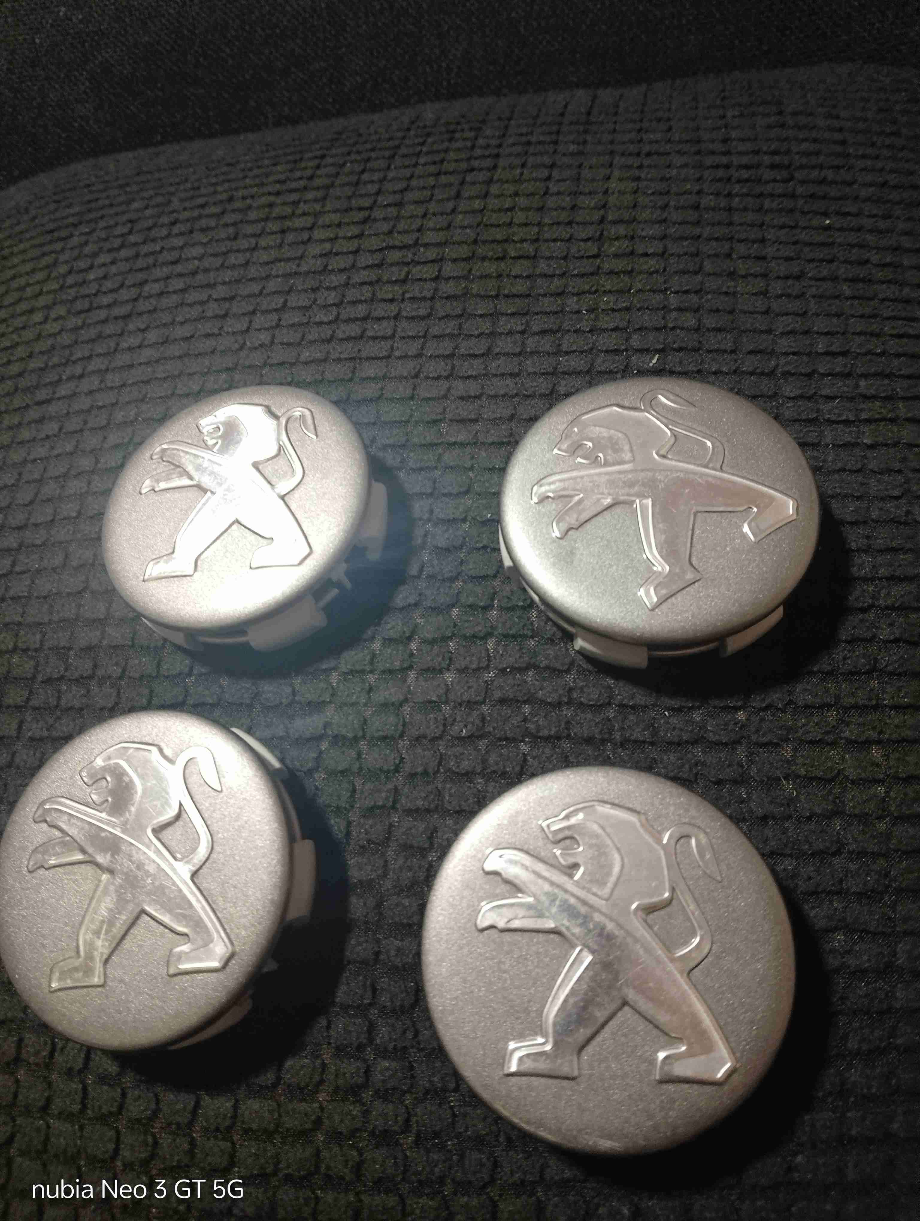 Tapacubos metálicos Peugeot