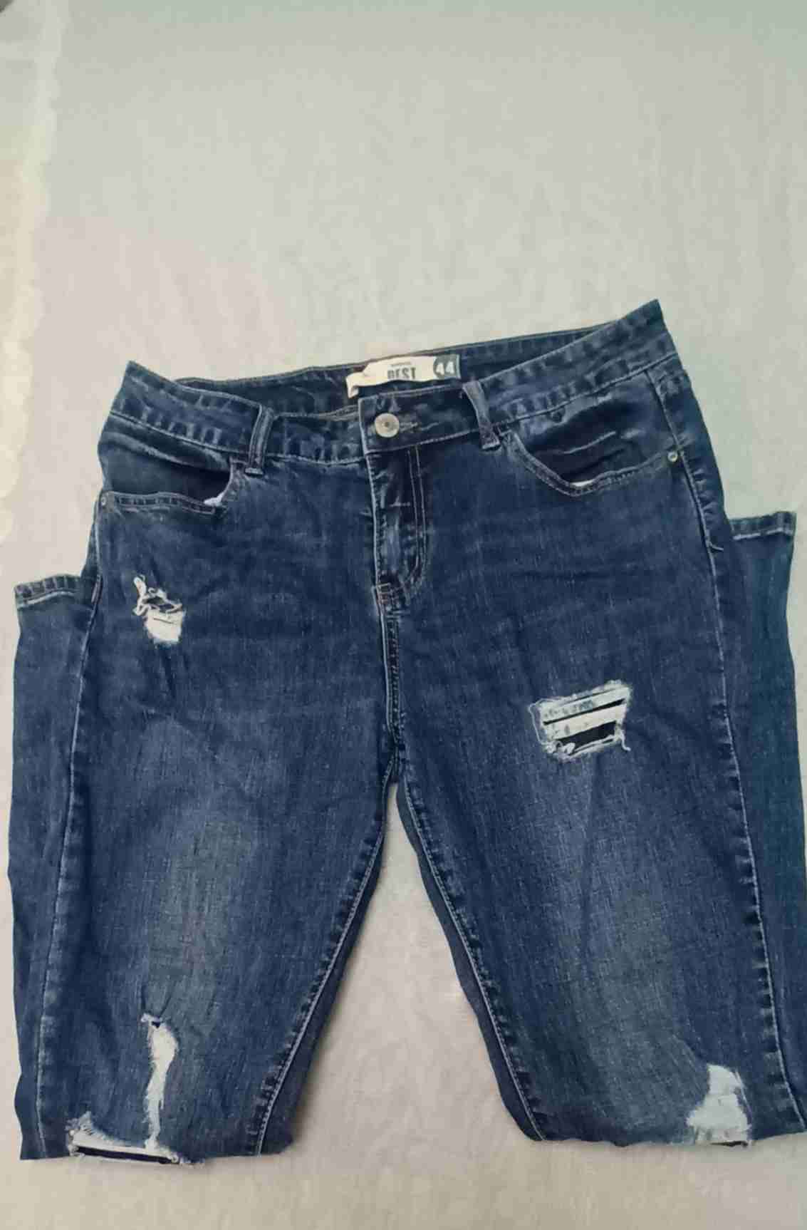 Jeans azul desgastados barbados 44