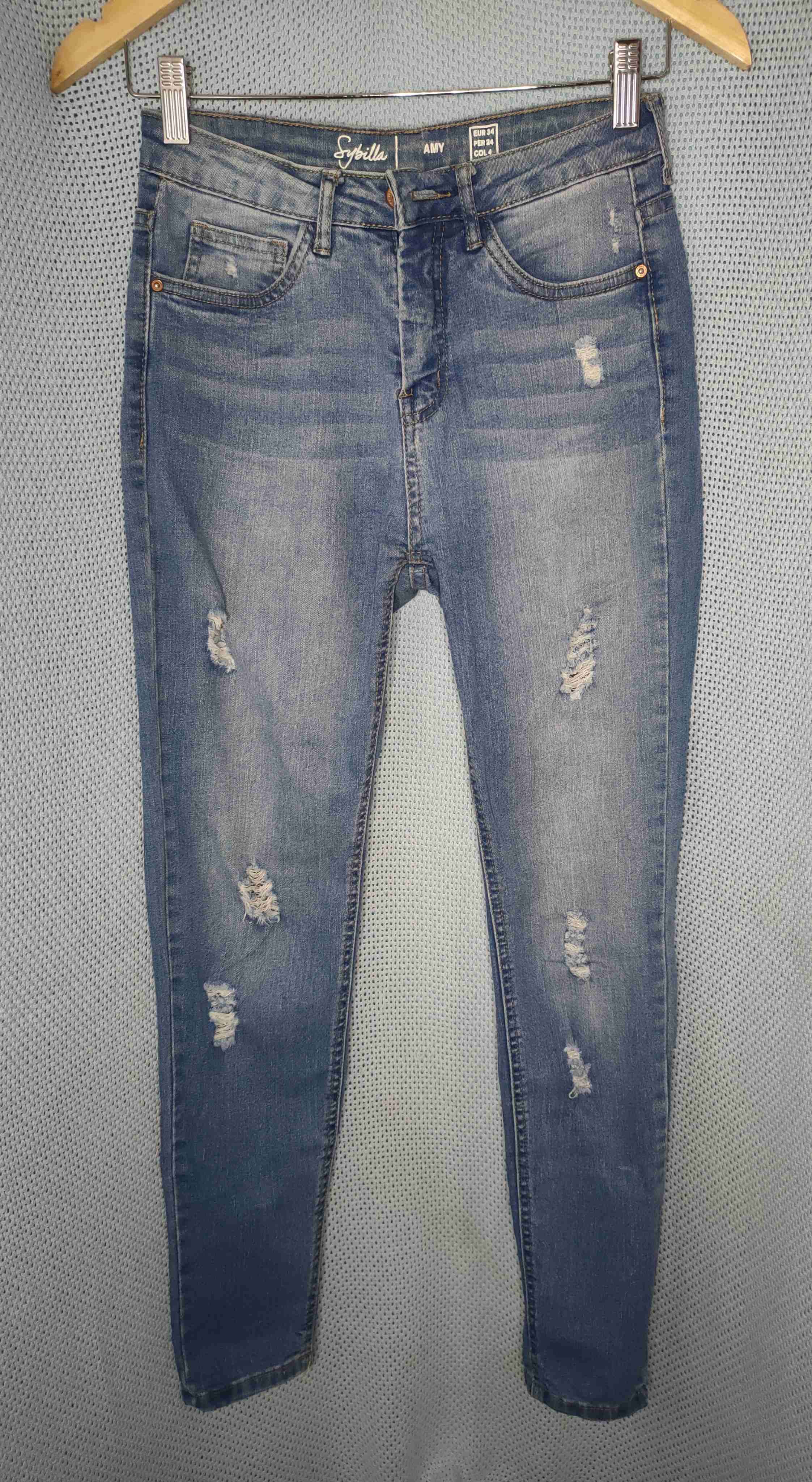 Jeans desgastados de mujer