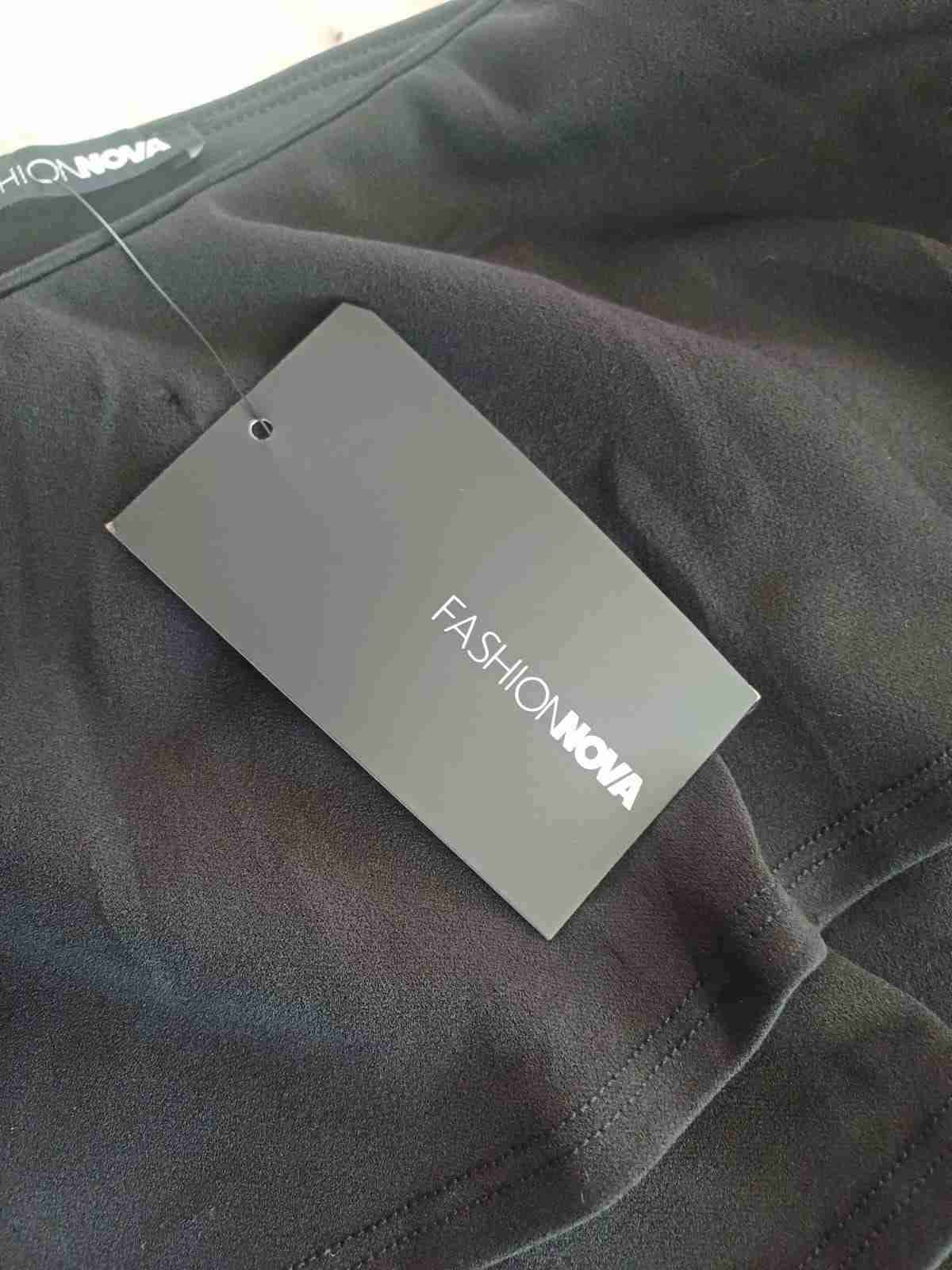 Enteriso negro con etiqueta - miniatura 3