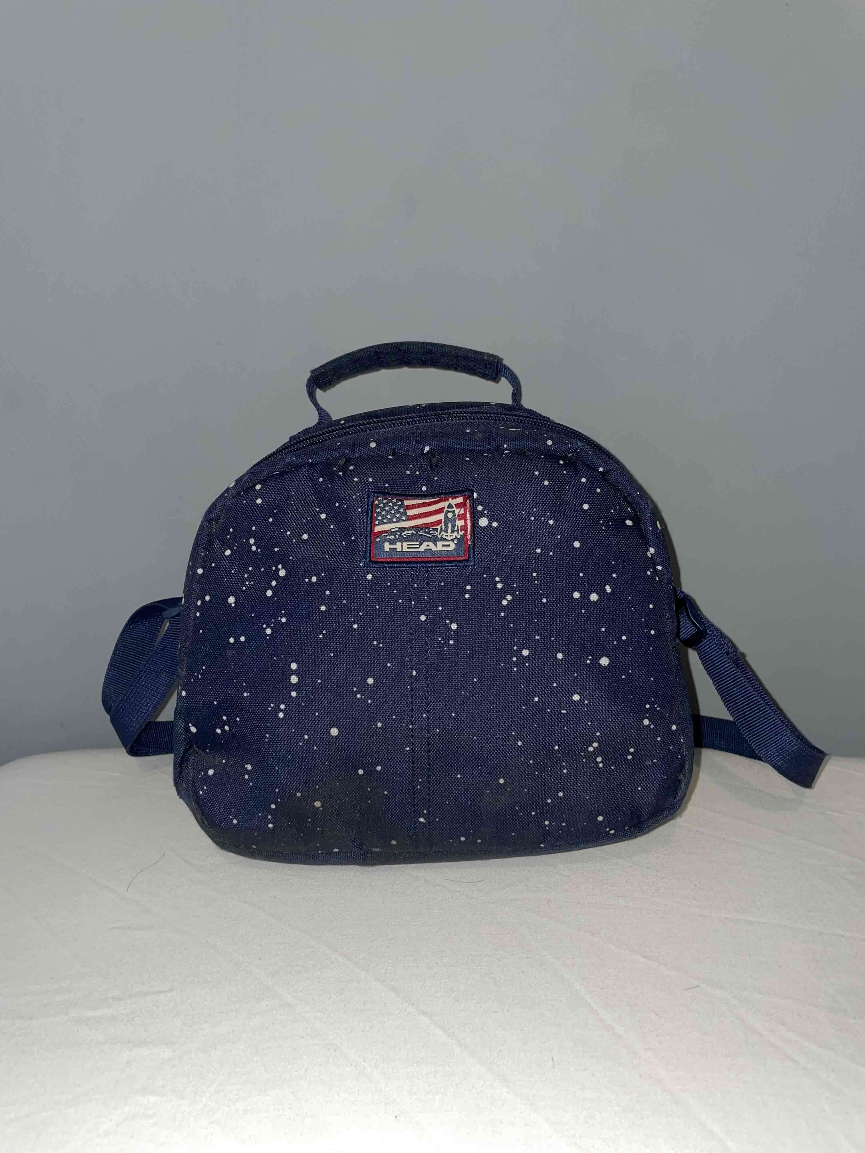 Lonchera azul con diseño espacial - 1