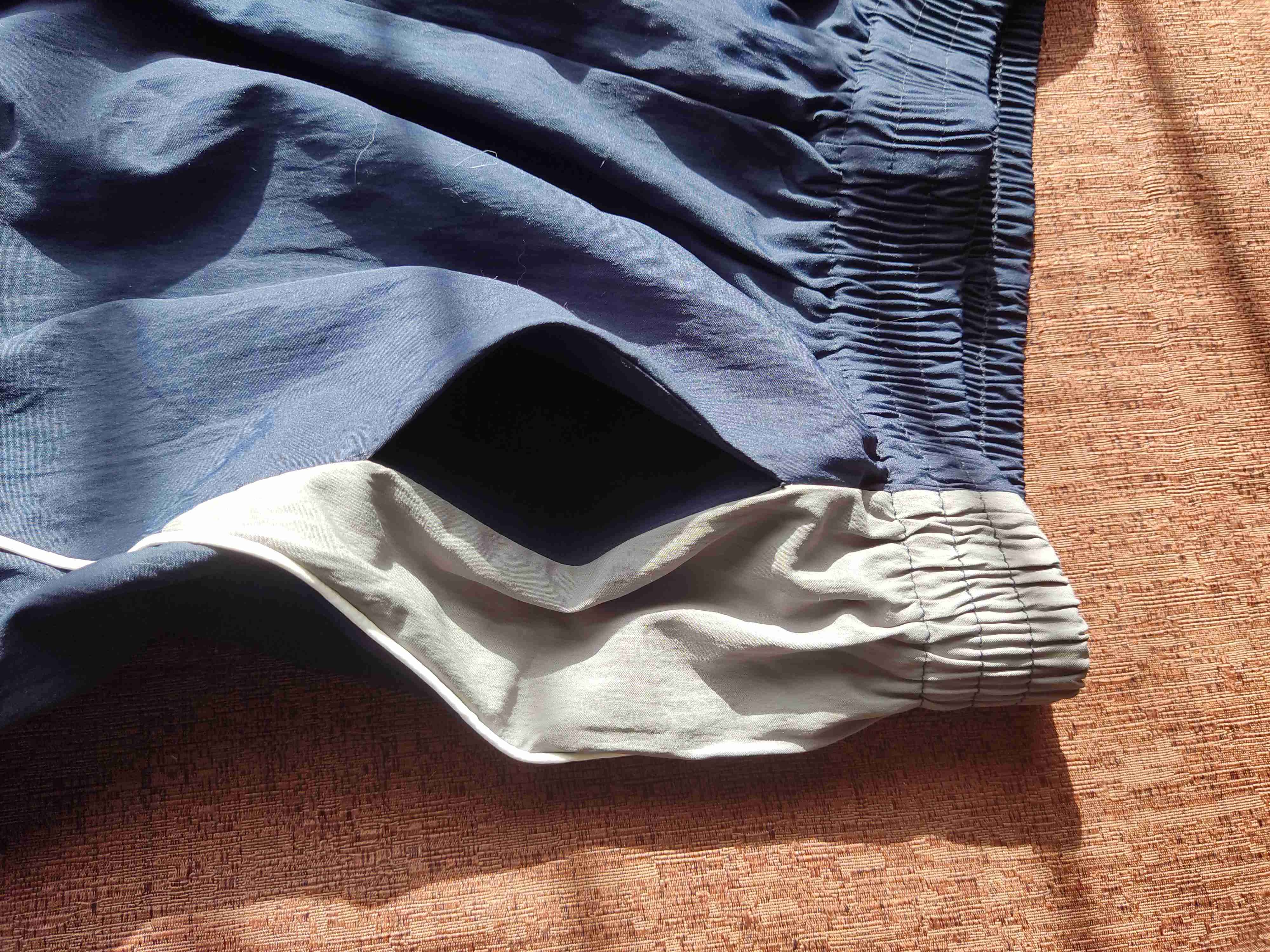 Shorts deportivos azul y blanco - miniatura 6