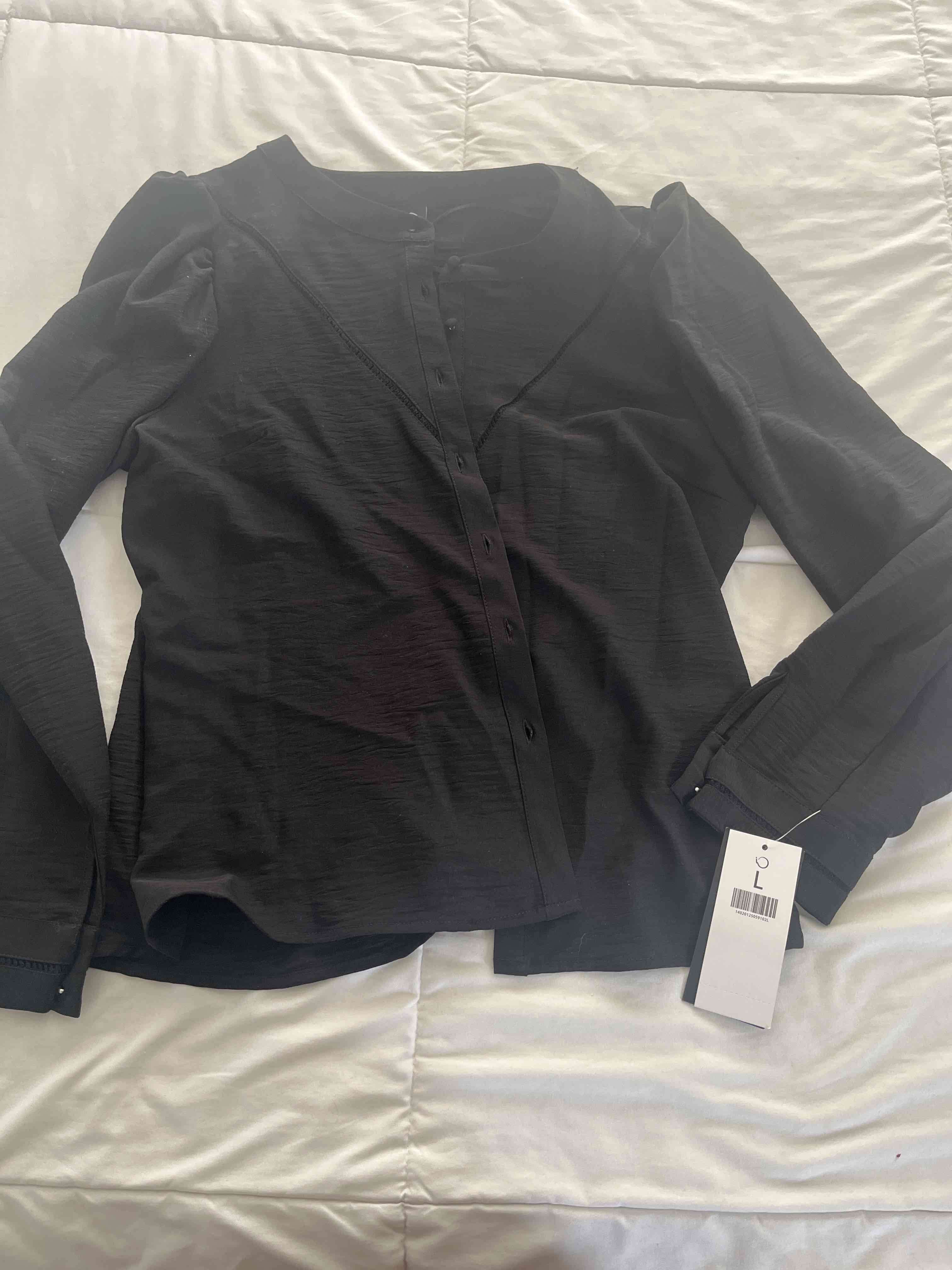 Blusa negra nueva