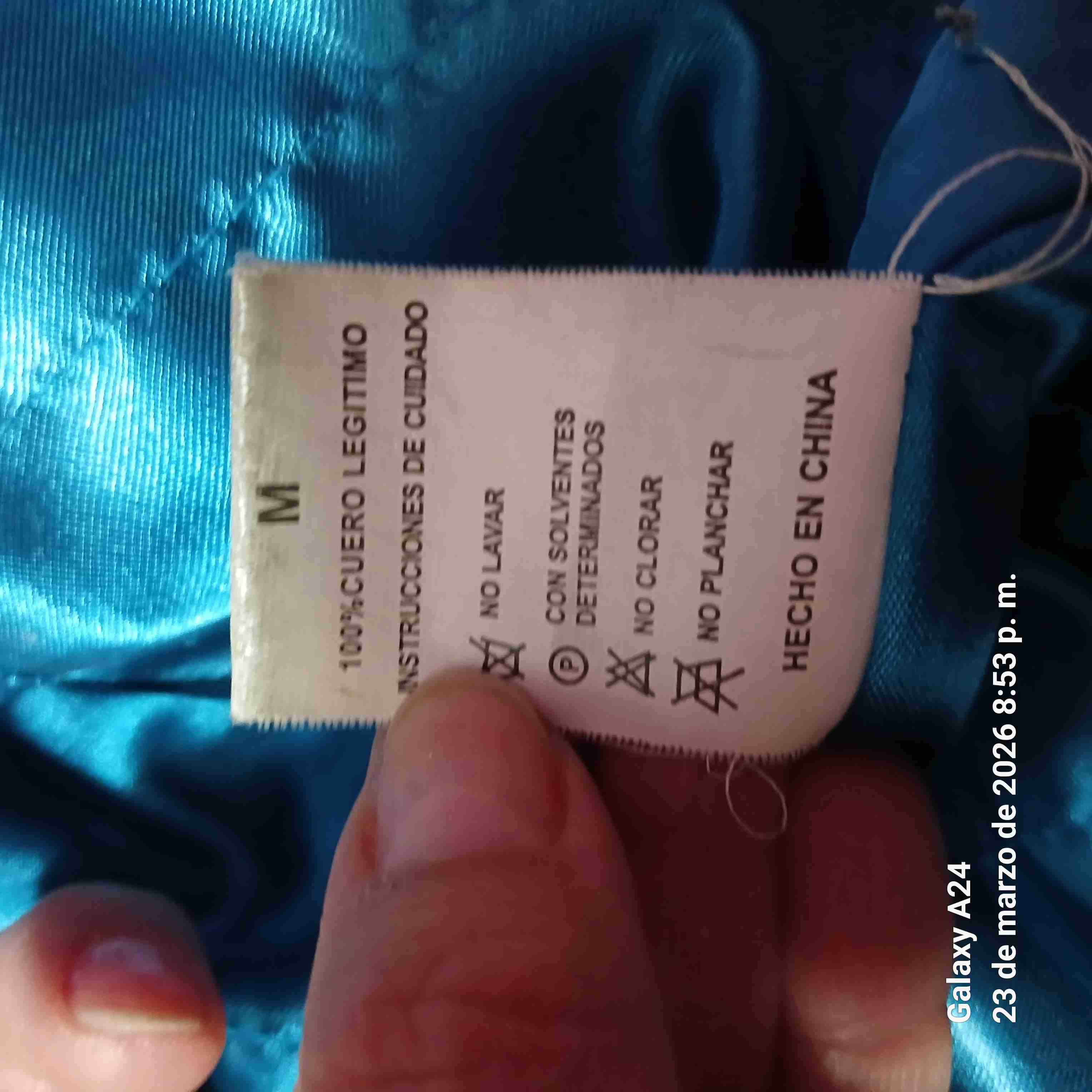 Chaqueta azul de cuero - miniatura 4