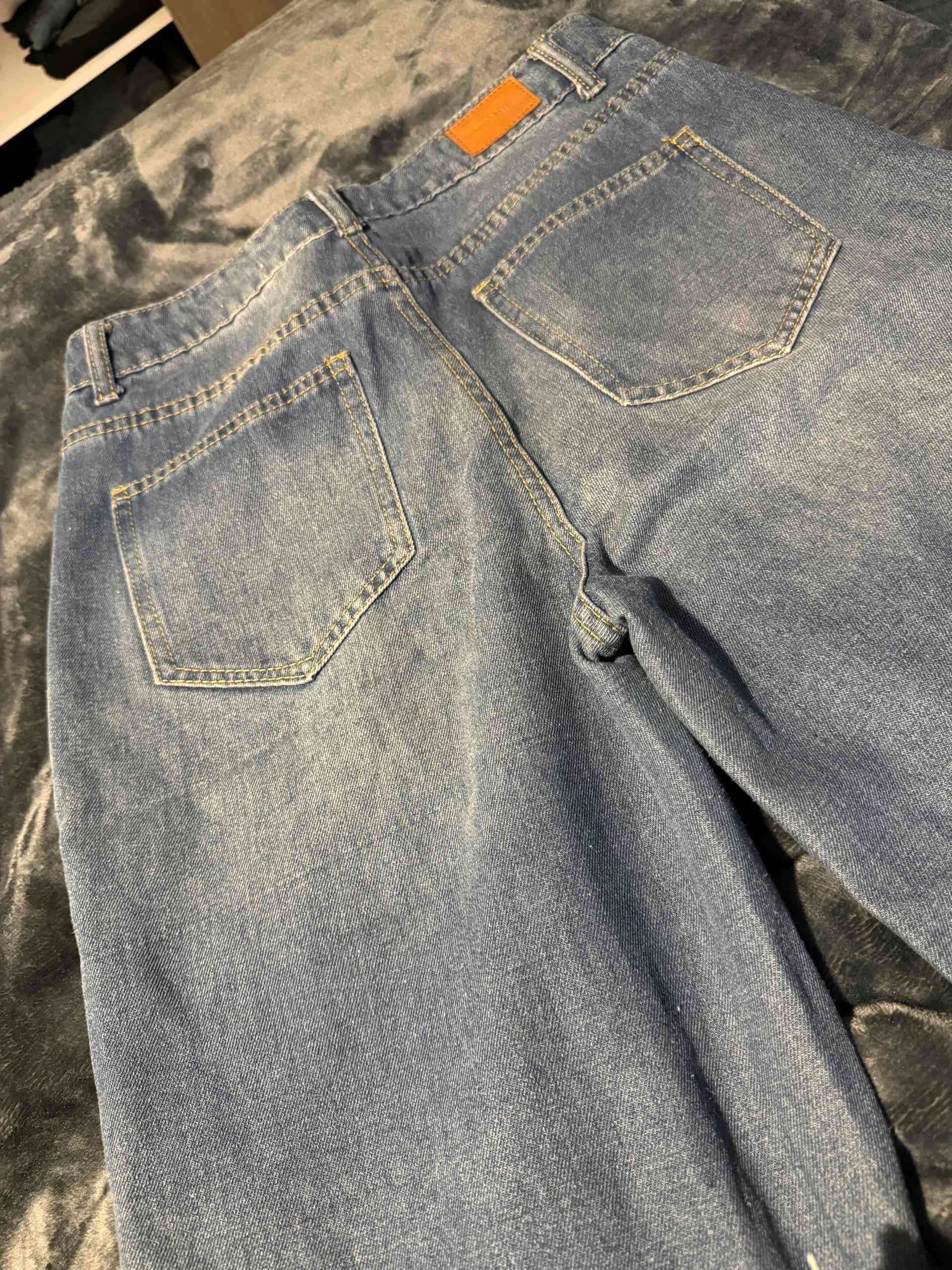 Jeans azules destroyed wide lef - miniatura 4