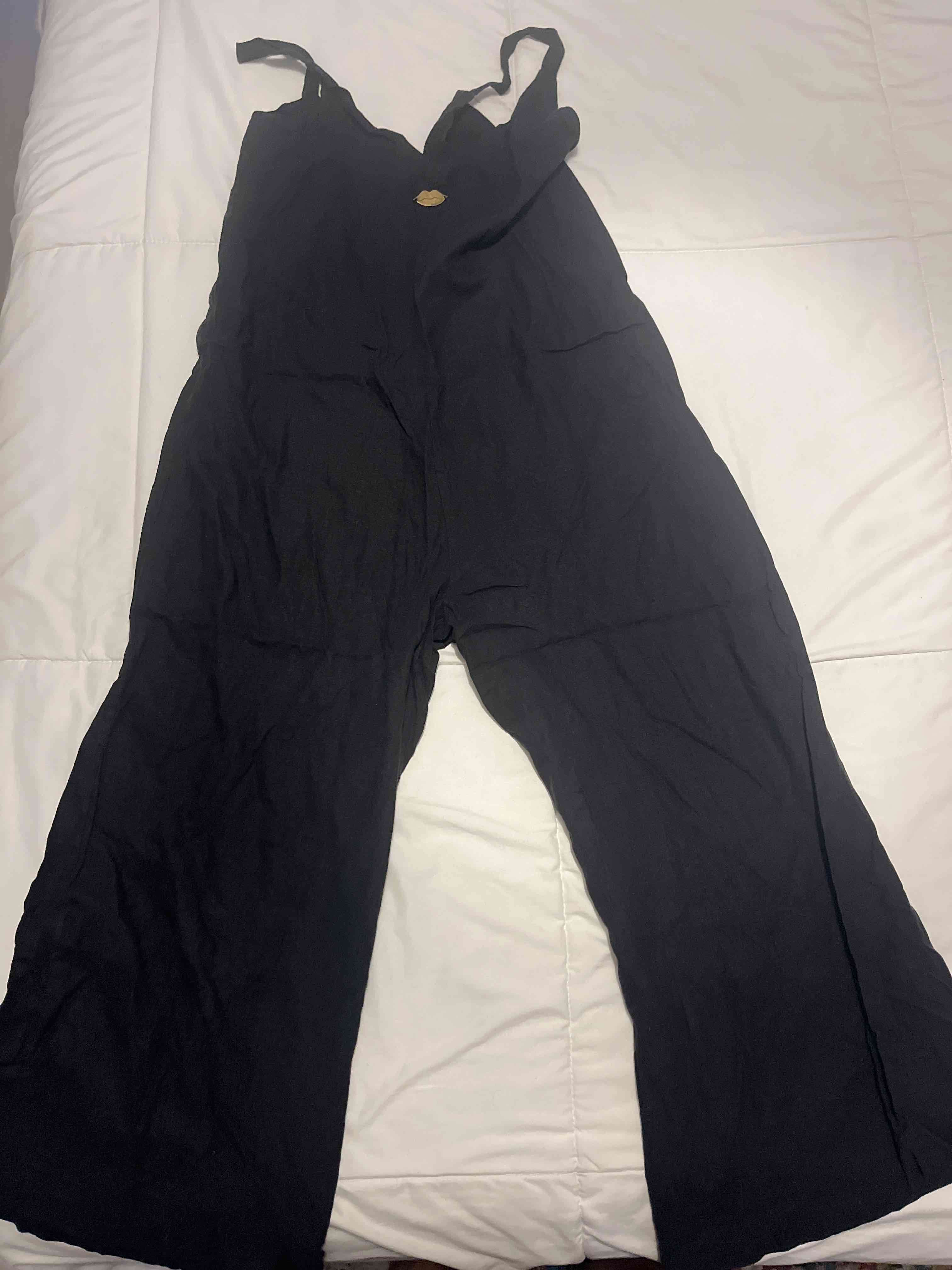 Jumpsuit negro sin mangas - miniatura 2