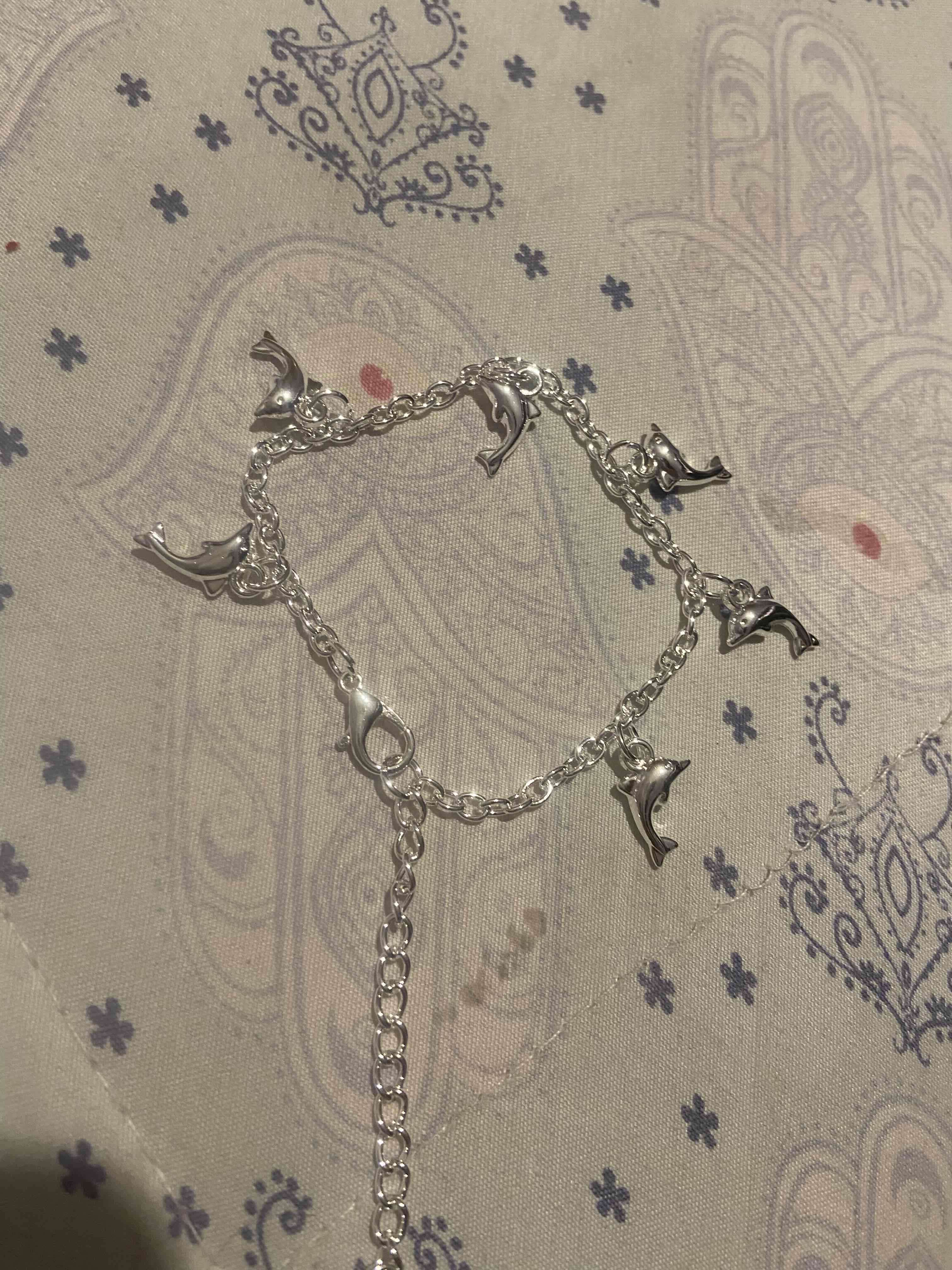 Pulsera con colgantes de delfines