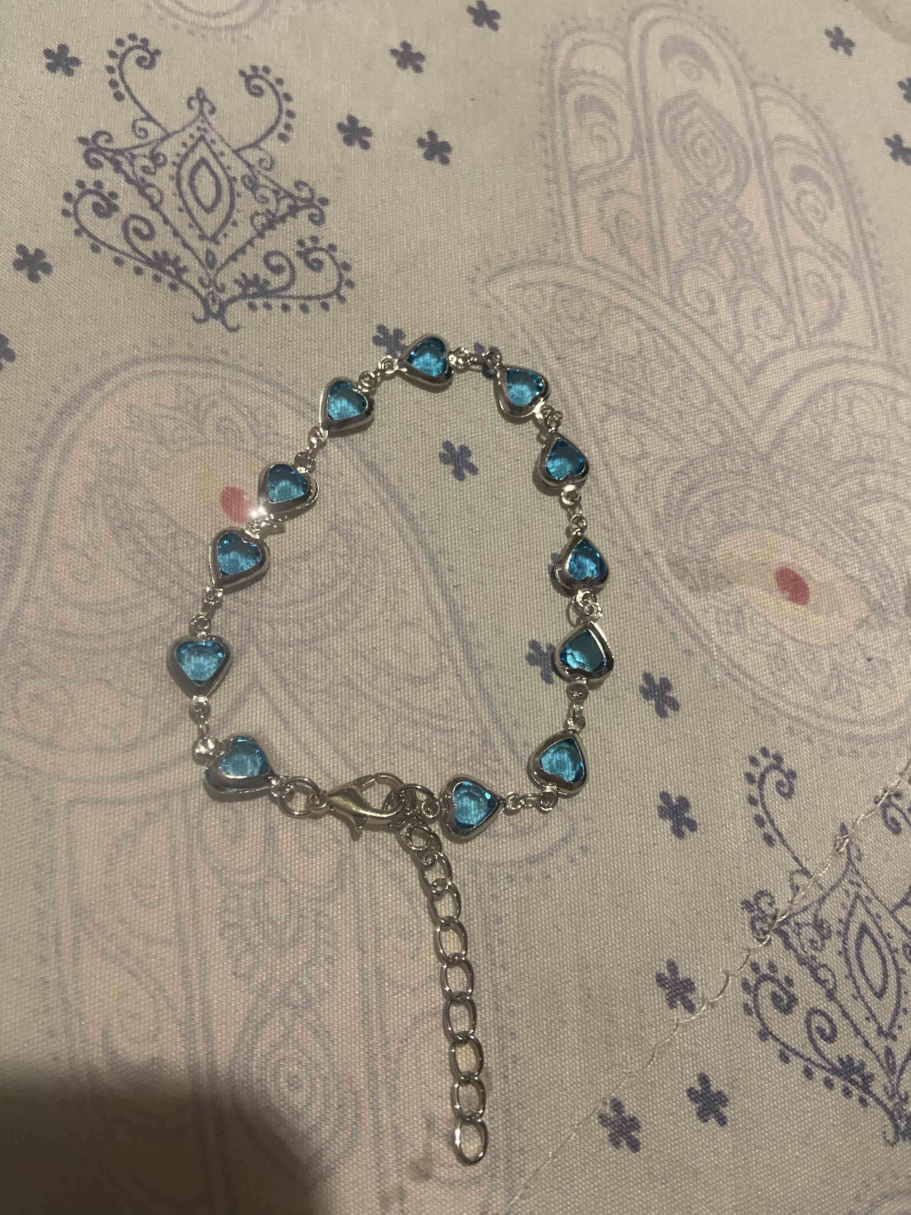Pulsera plata con corazones azules