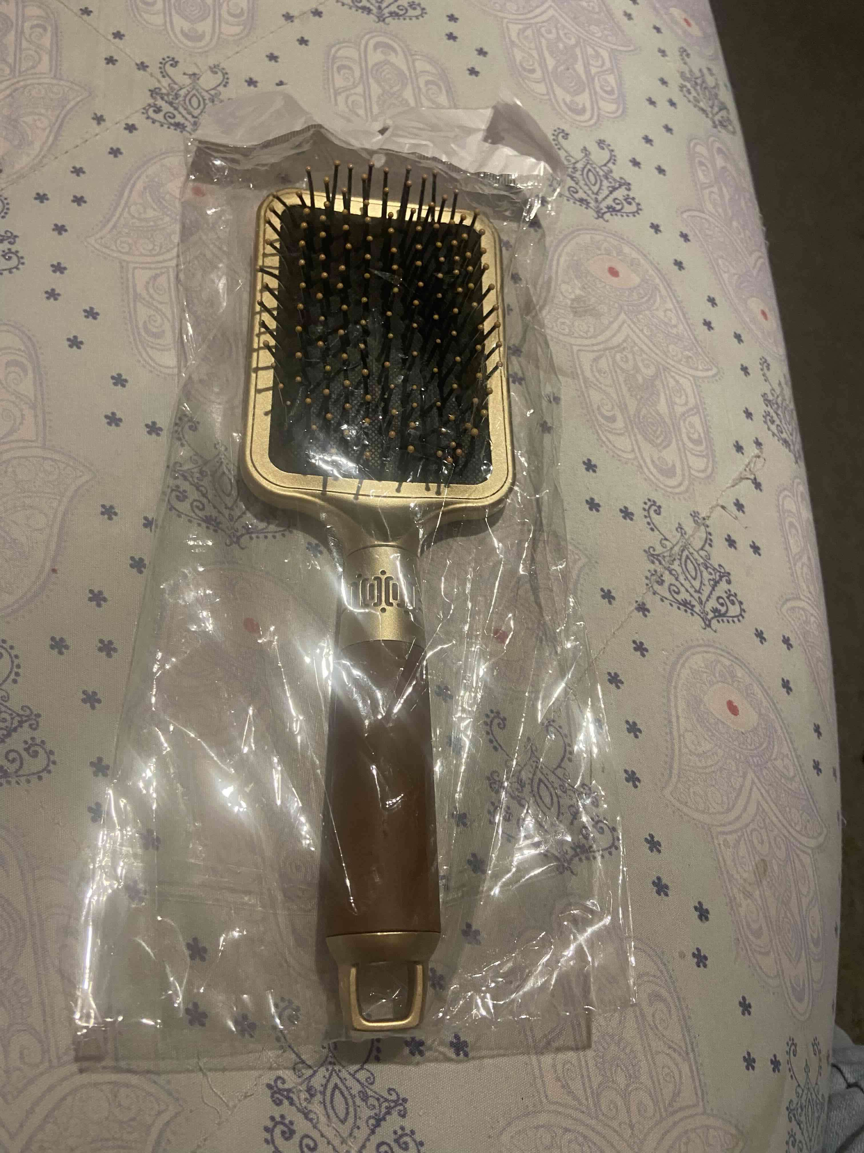 Cepillo de pelo dorado