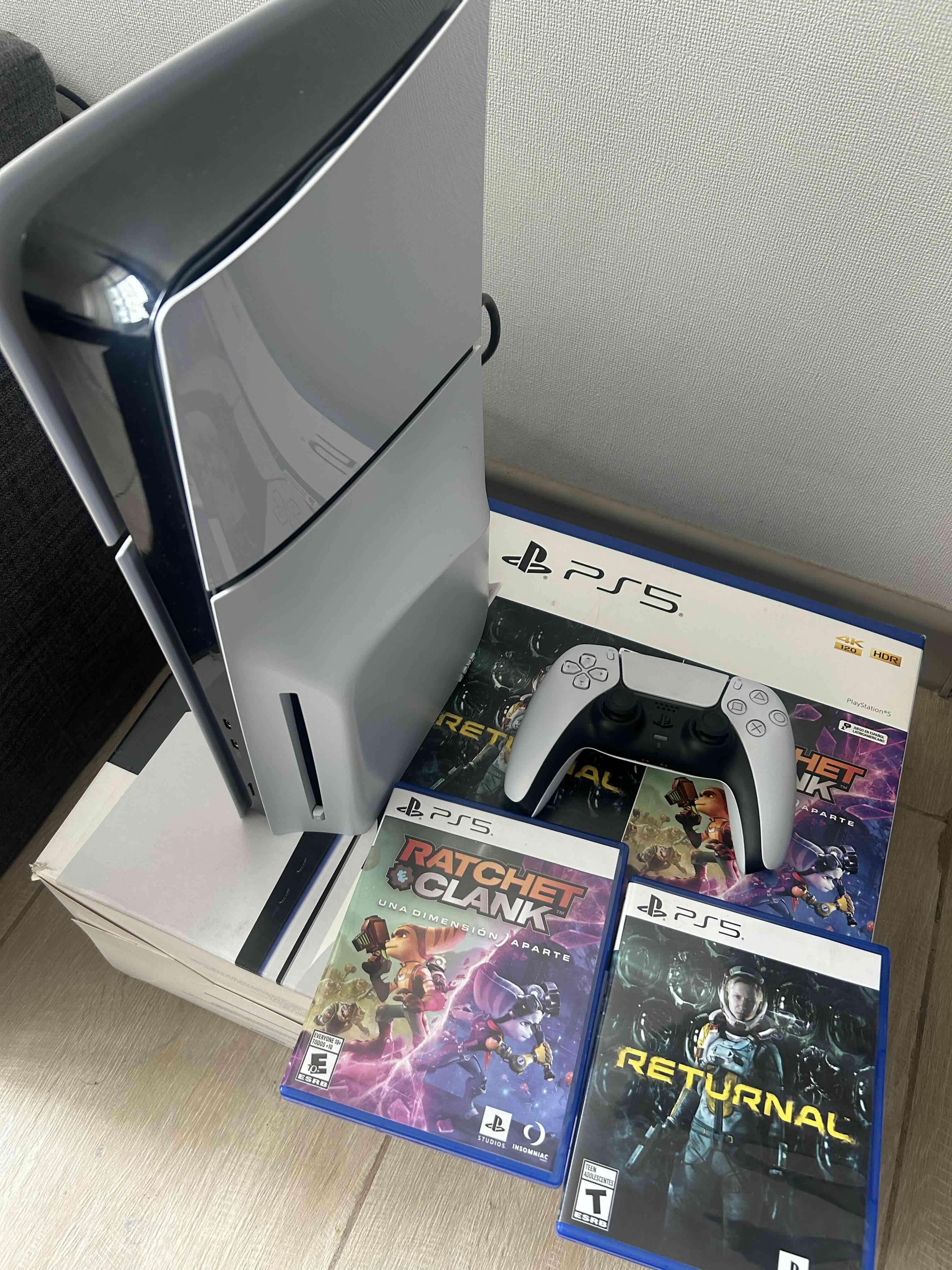 PlayStation 5 con juegos incluidos - miniatura 1