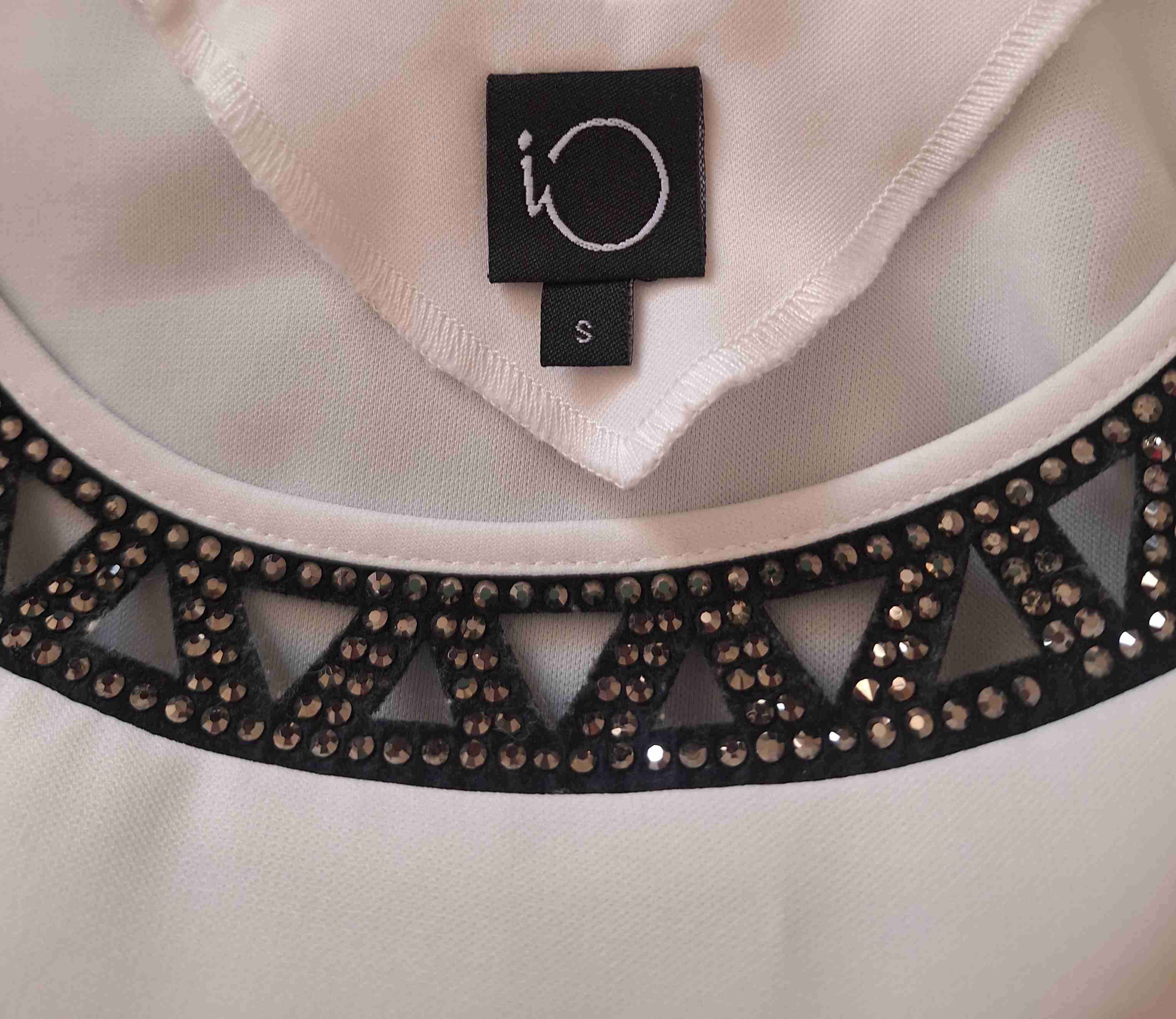 Blusa blanca sin mangas - miniatura 3