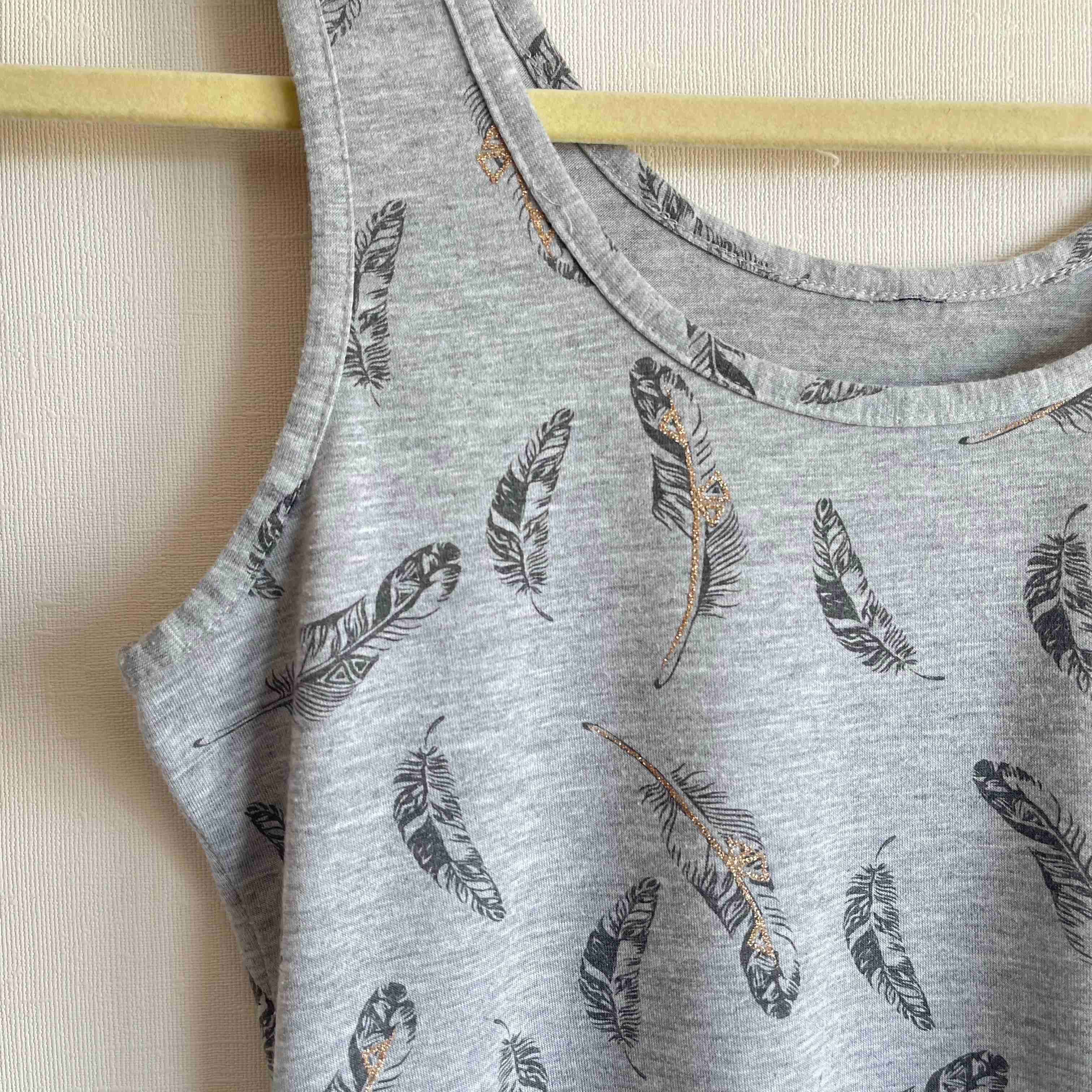 Polera Gris Plumas S - miniatura 2