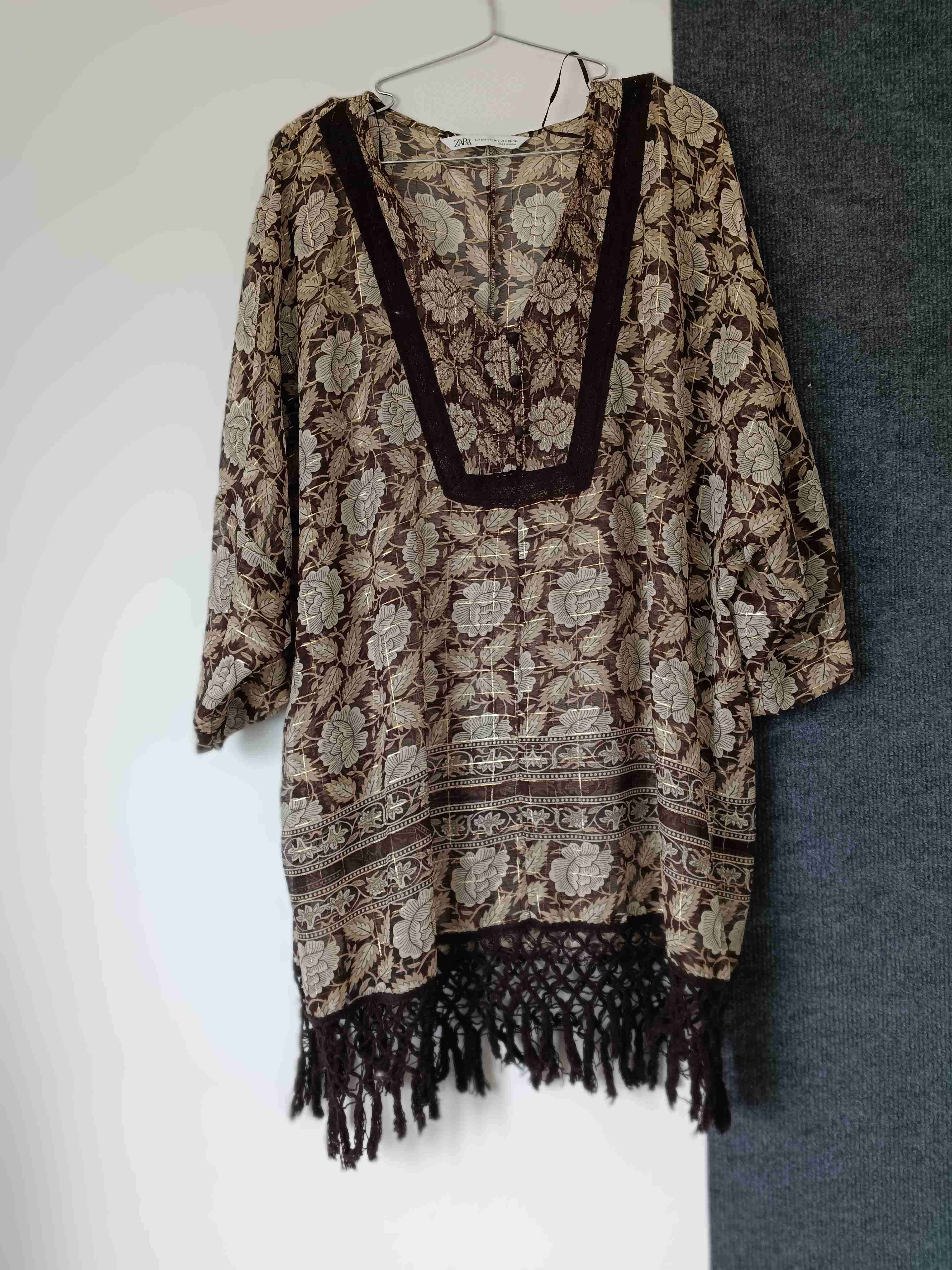 Túnica floral con flecos