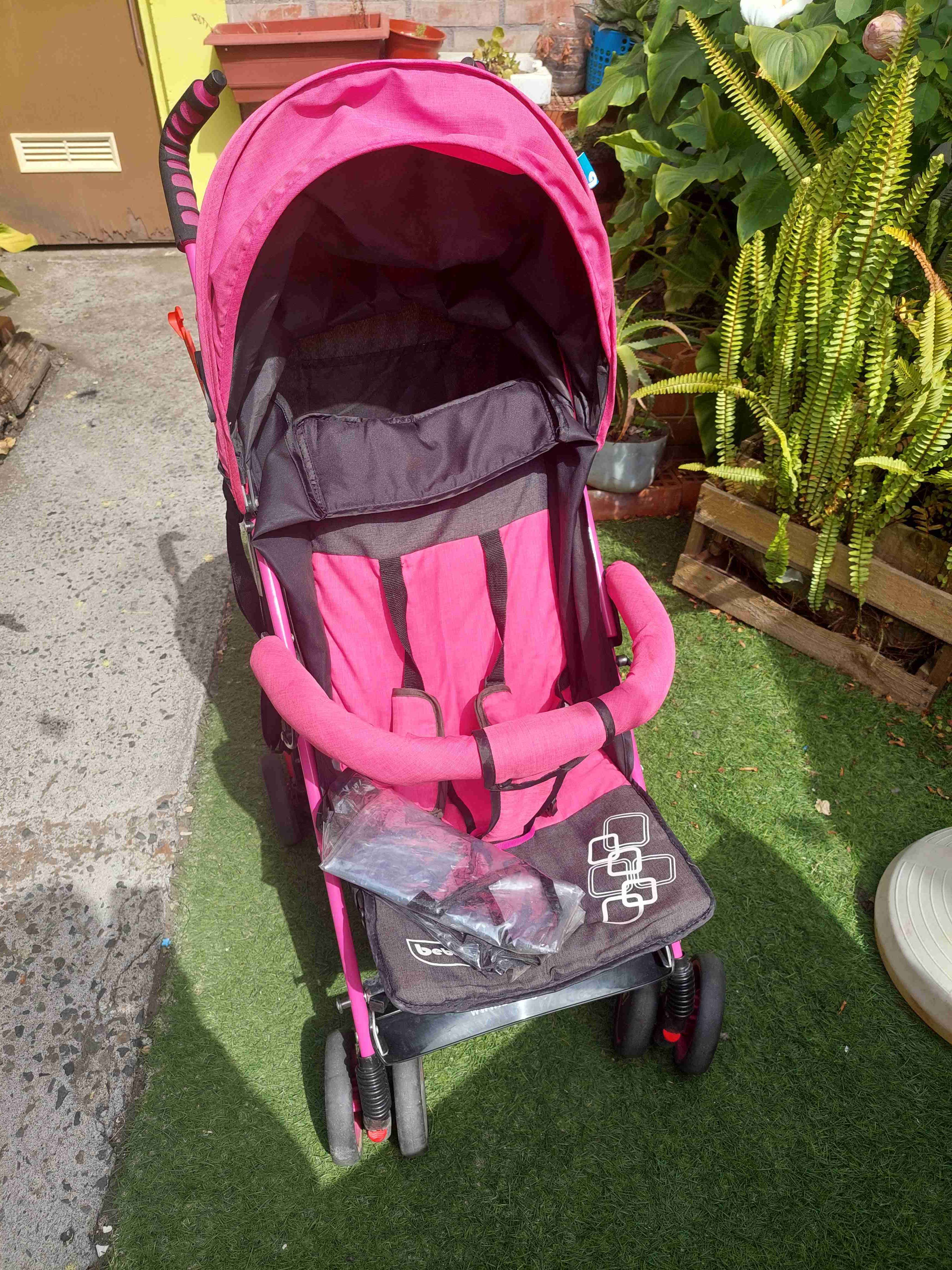Coche de bebé rosa - miniatura 2