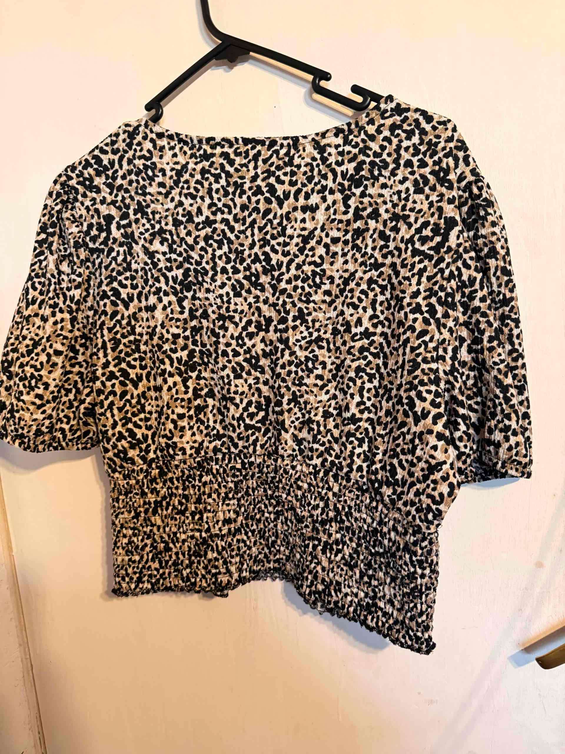 Blusa estampado animal print - miniatura 3