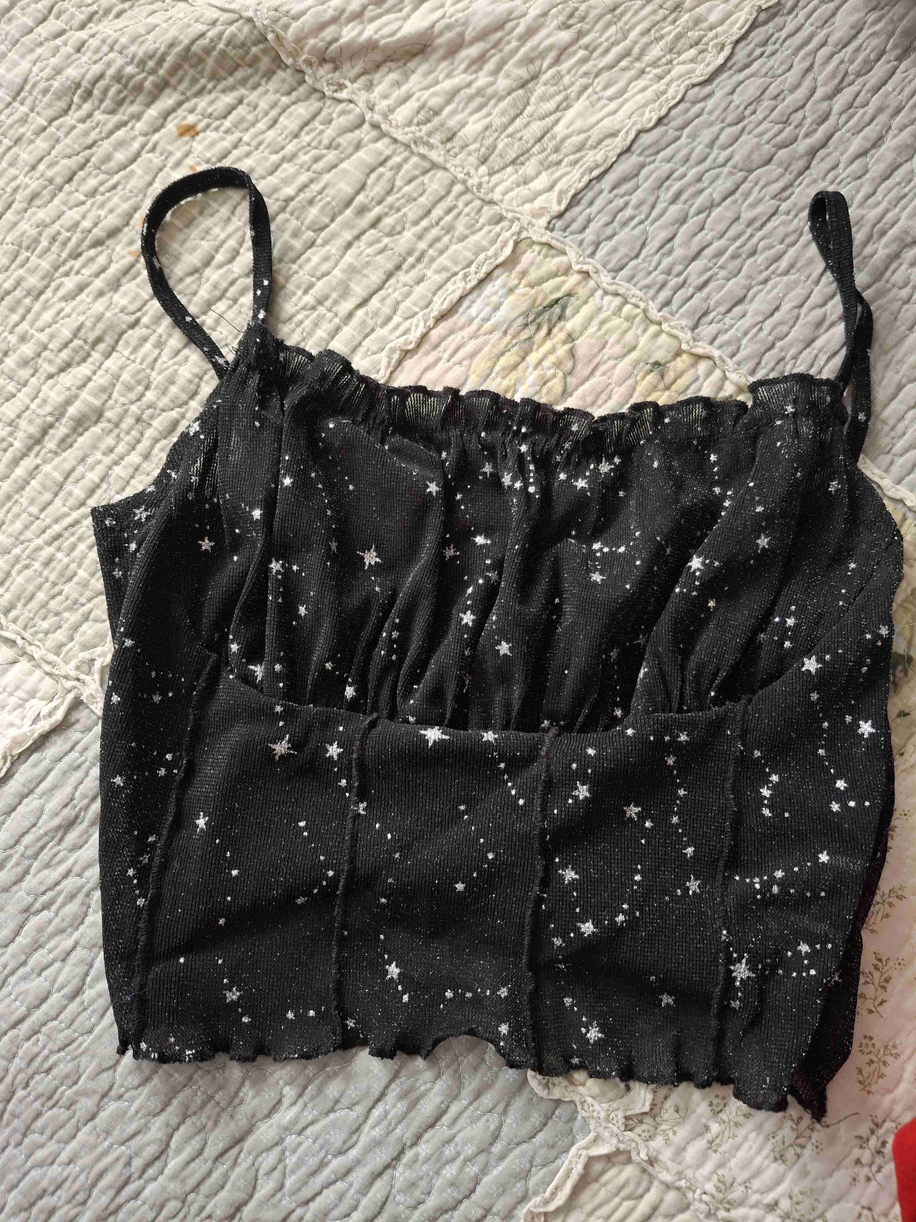 Top negro con estrellas