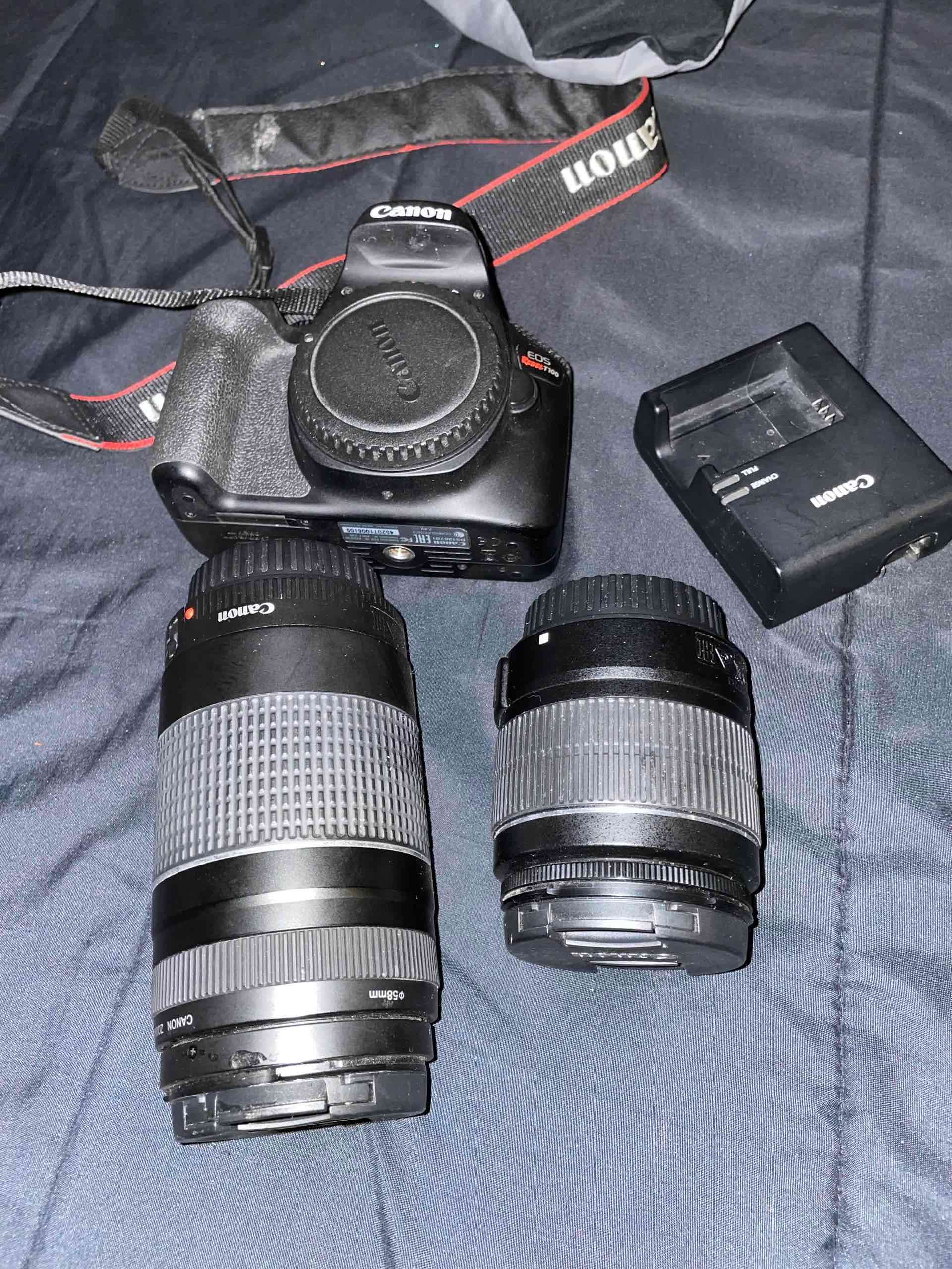 Cámara Canon Rebel T100 con lentes y cargador - miniatura 2