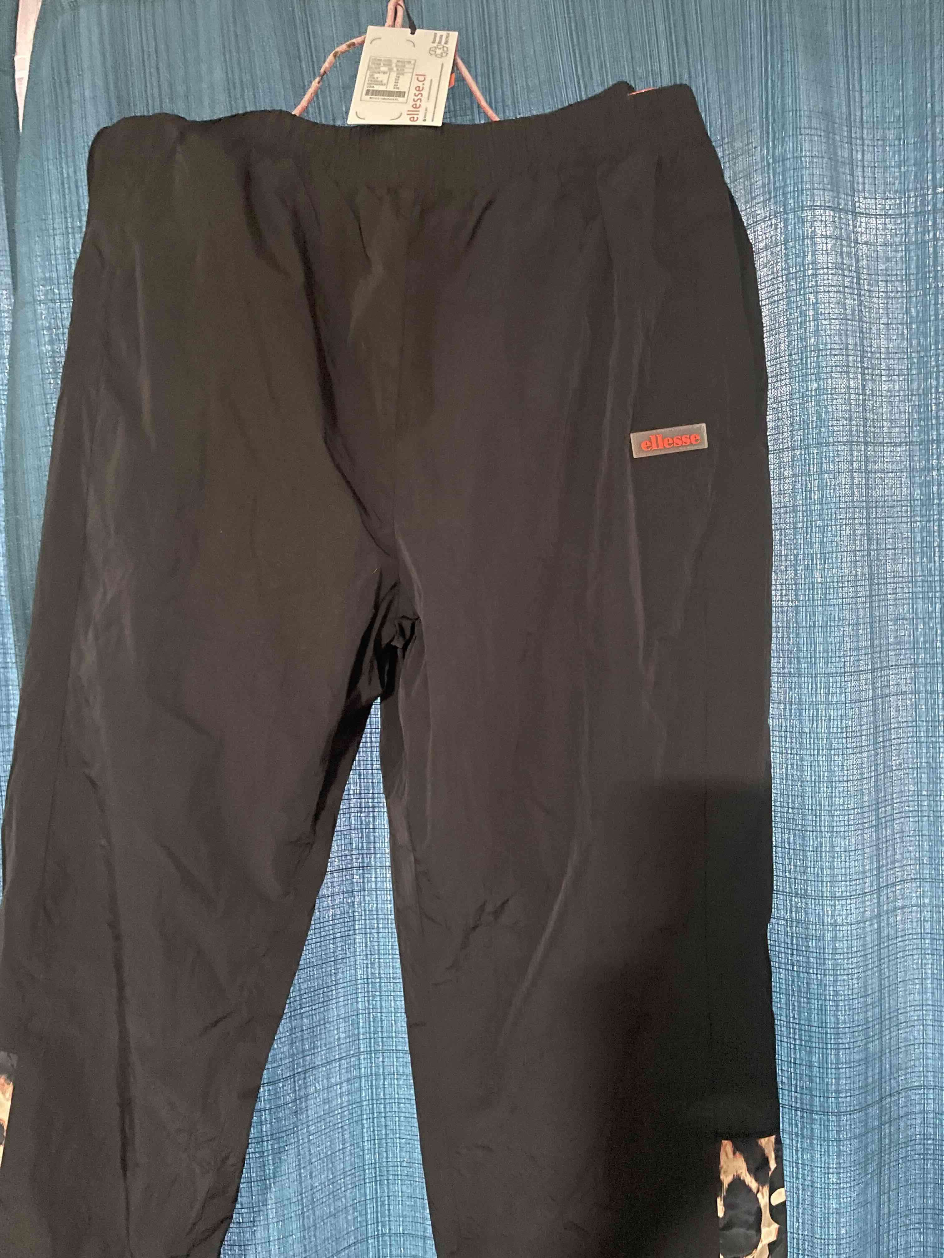 Pantalones deportivos negros con estampado - miniatura 2
