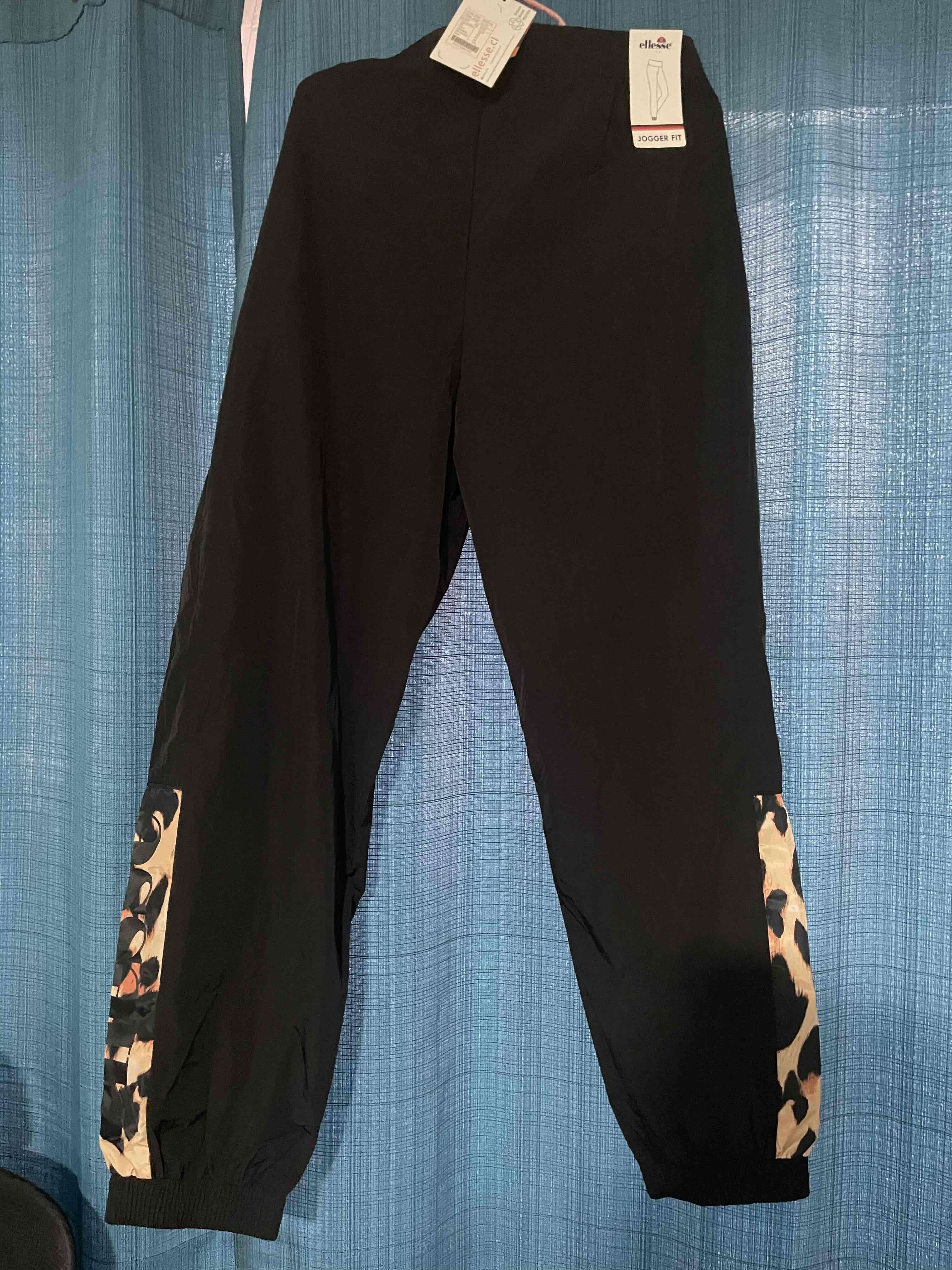 Pantalones deportivos negros con estampado - miniatura 4