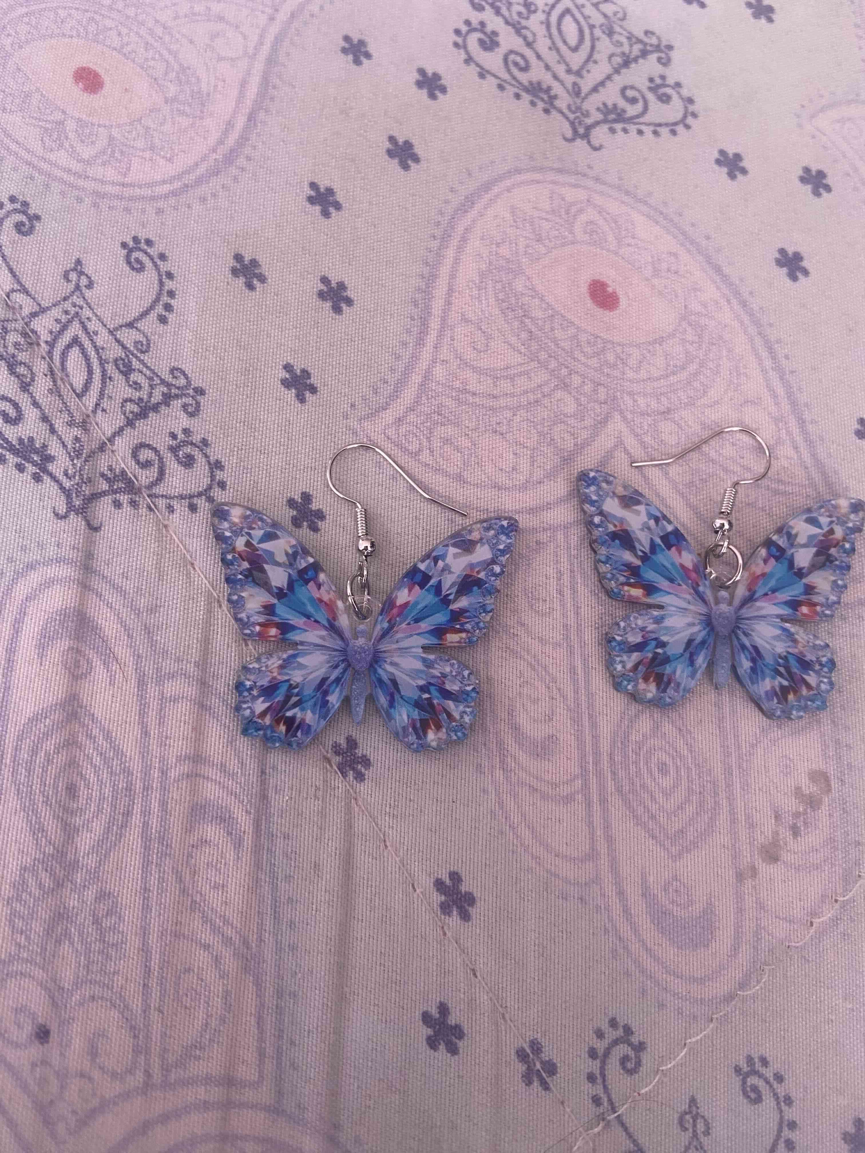 Aros con diseño de mariposa