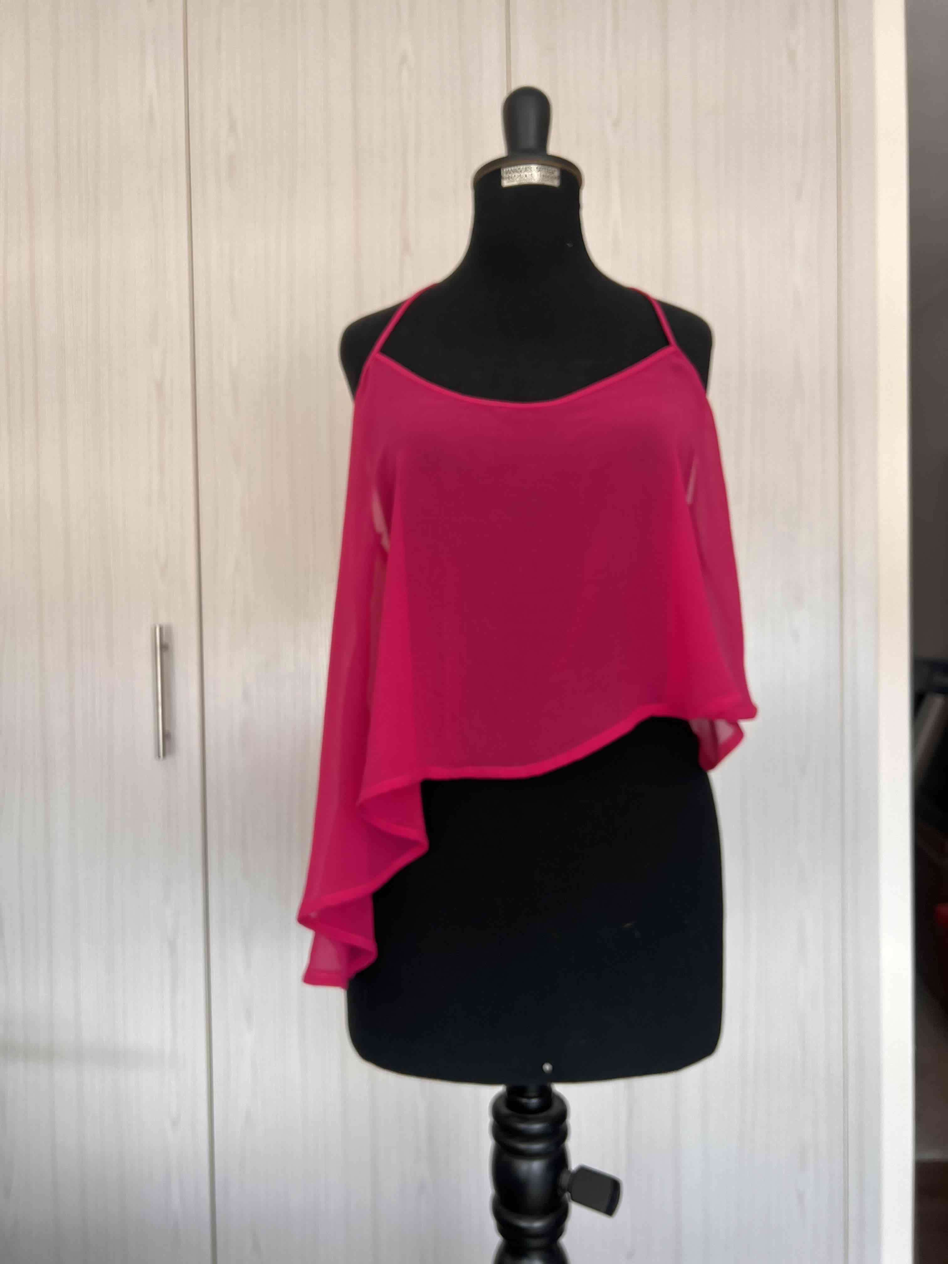 Blusa fucsia sin mangas