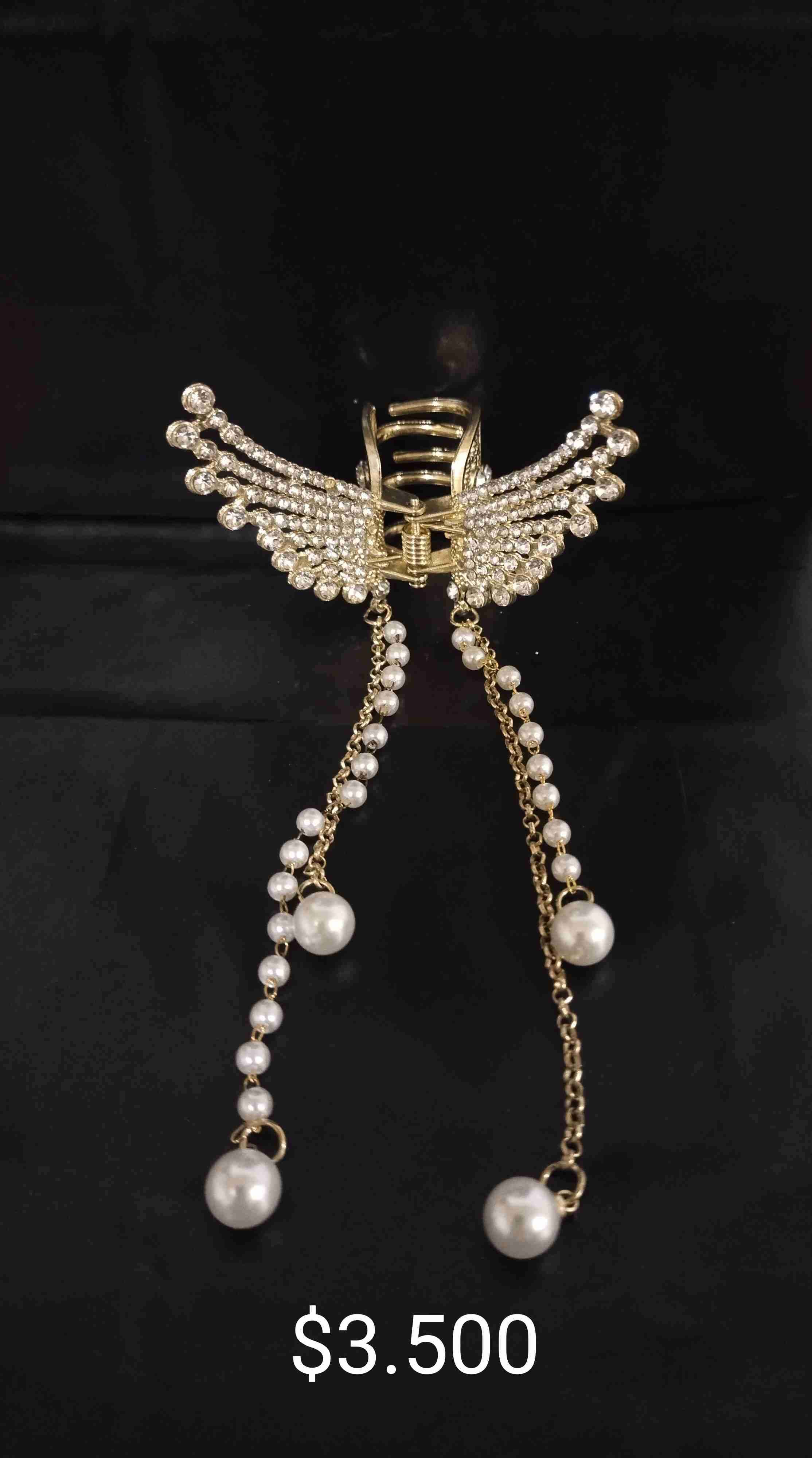 Pinza de cabello con perlas y brillo - miniatura 1