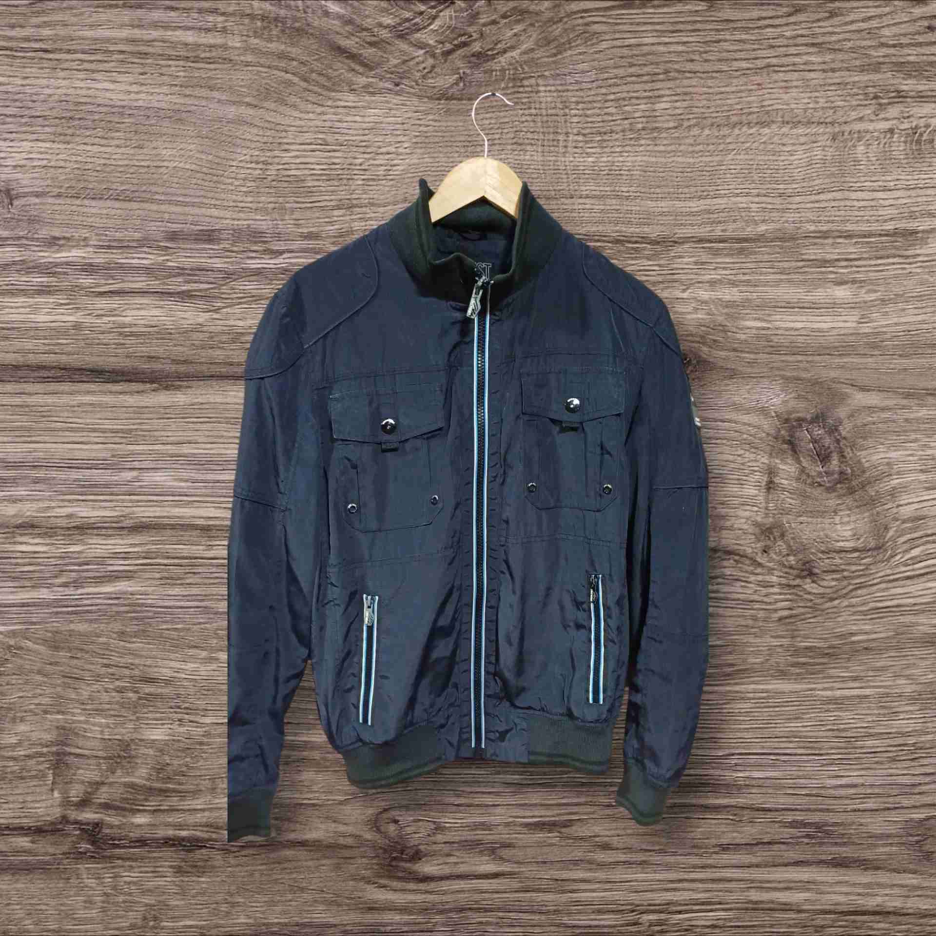 Chaqueta azul con cierre - miniatura 3