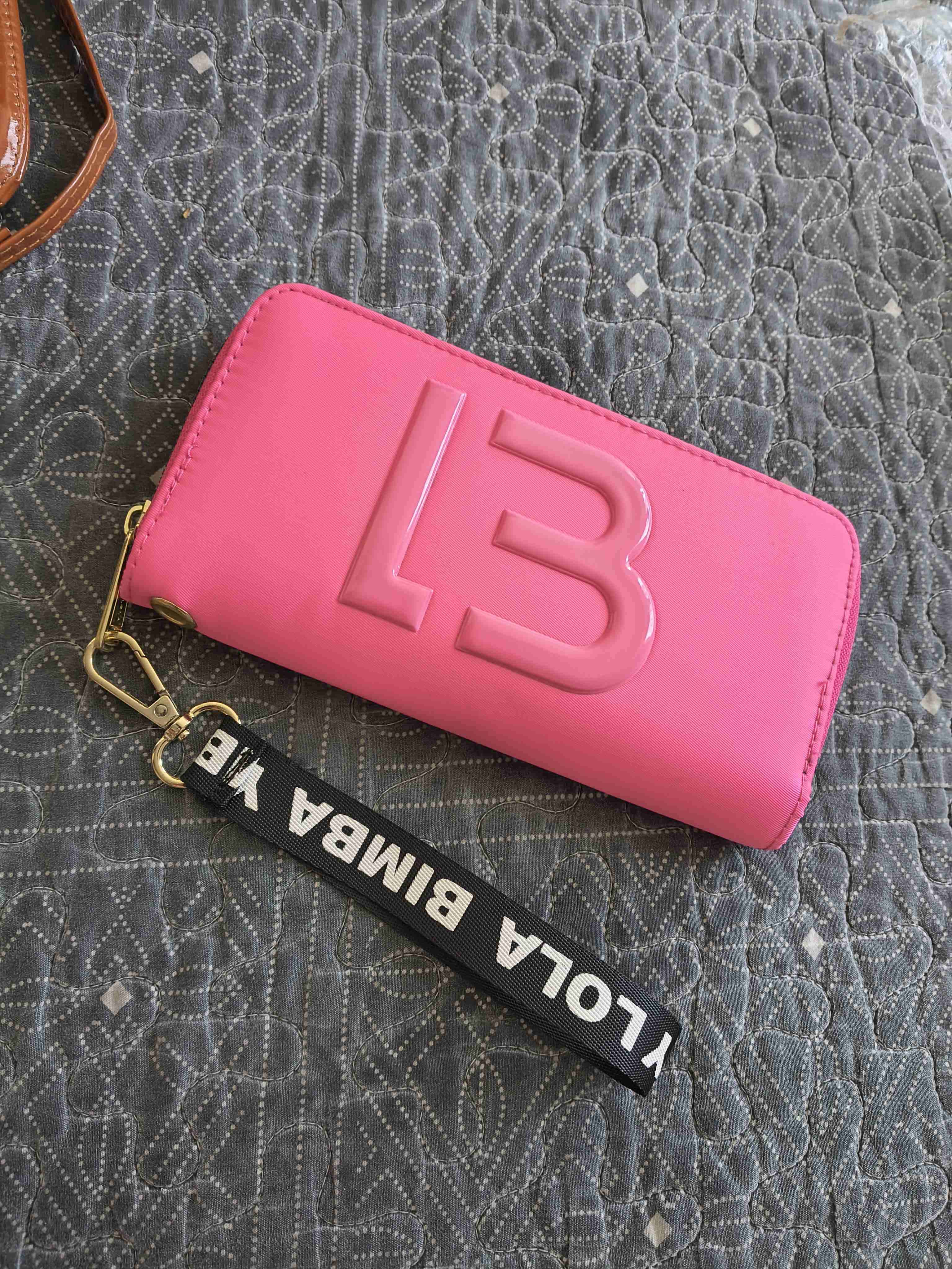 Cartera rosa tipo billetera