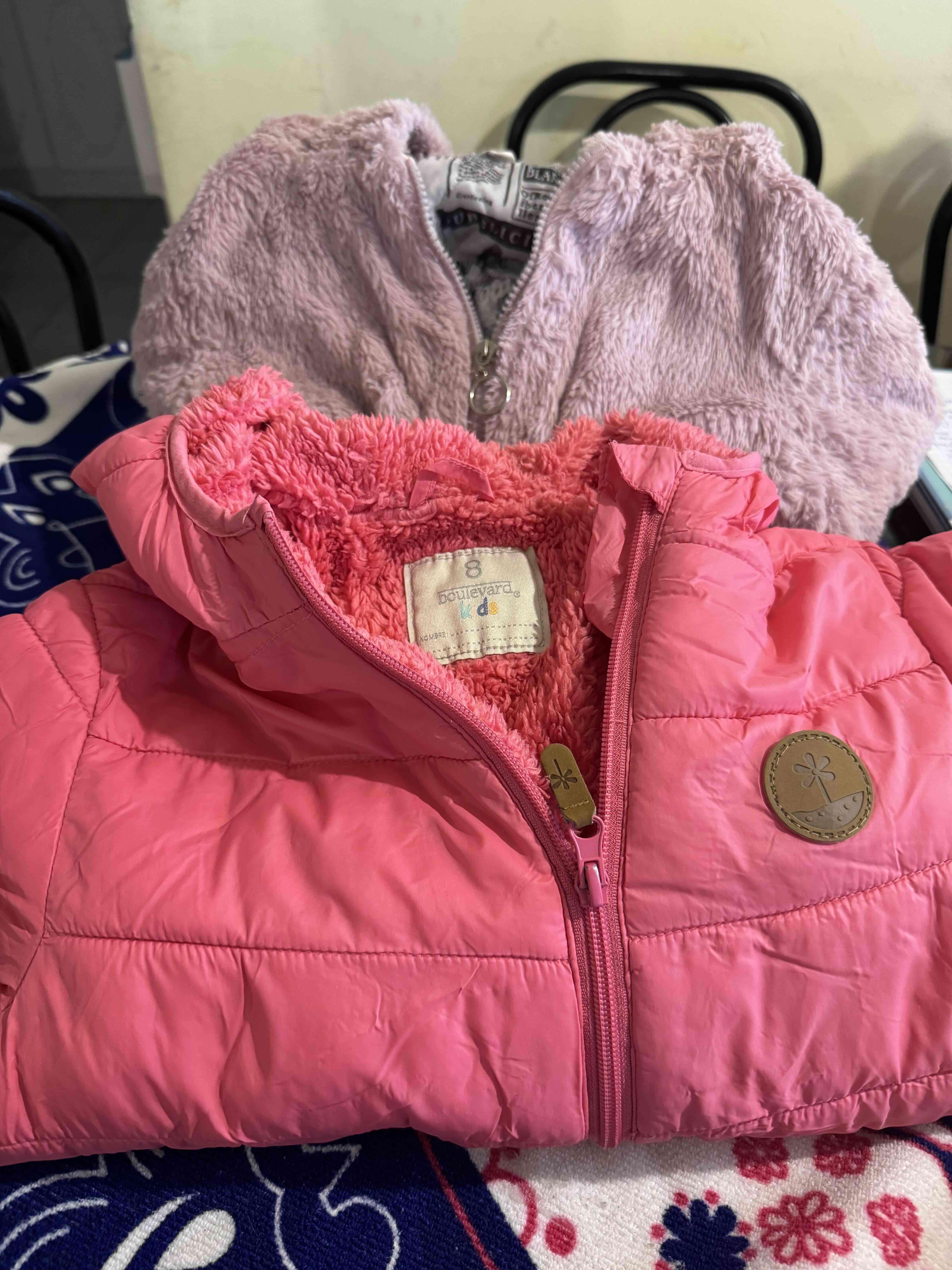 Chaqueta infantil rosa acolchada