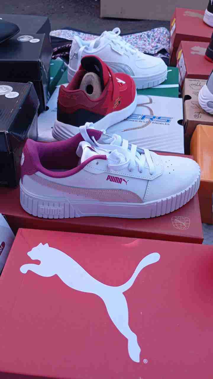 Zapatillas blancas y rojas Puma - miniatura 1