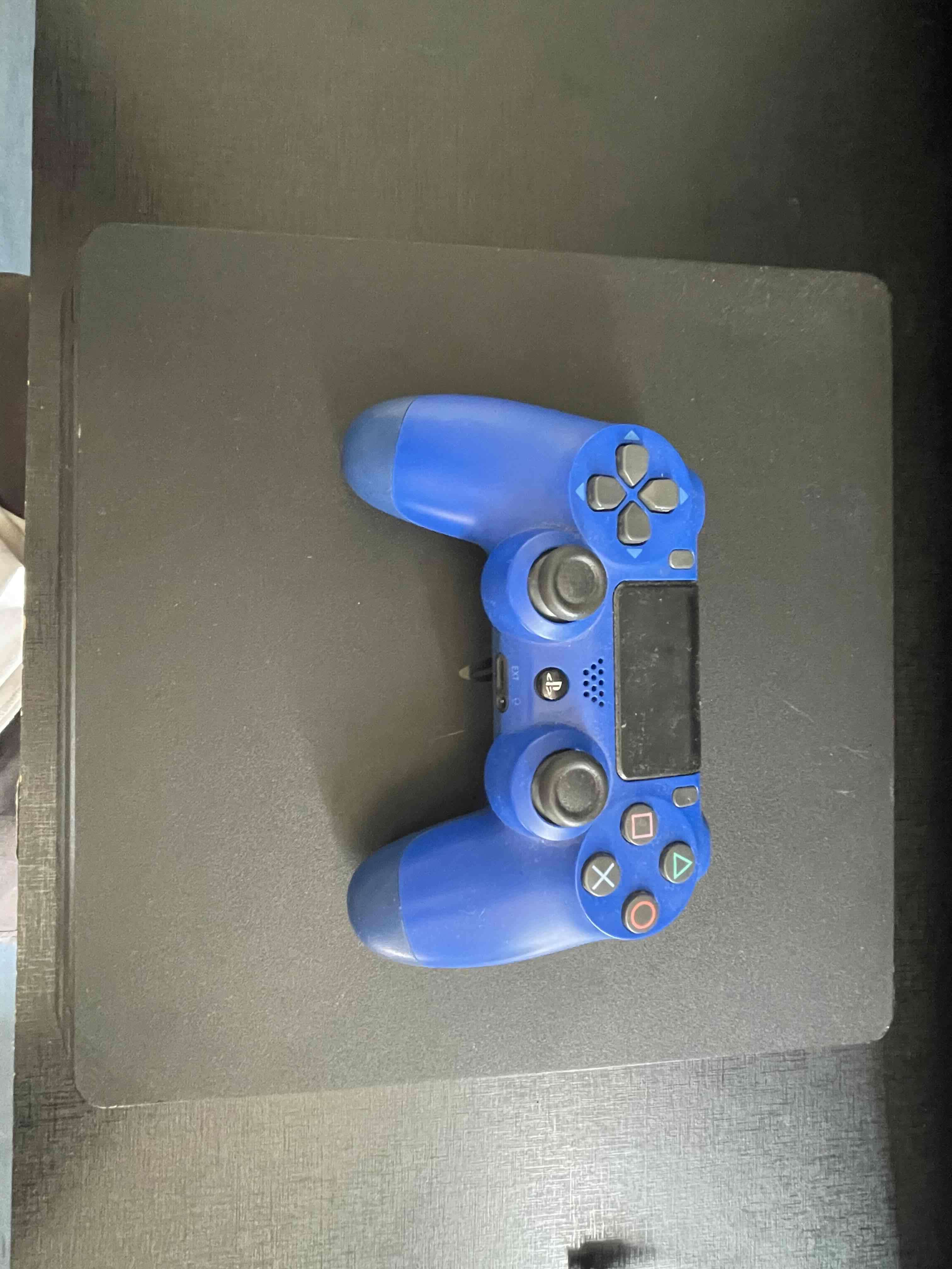 Consola de videojuegos con control - miniatura 1