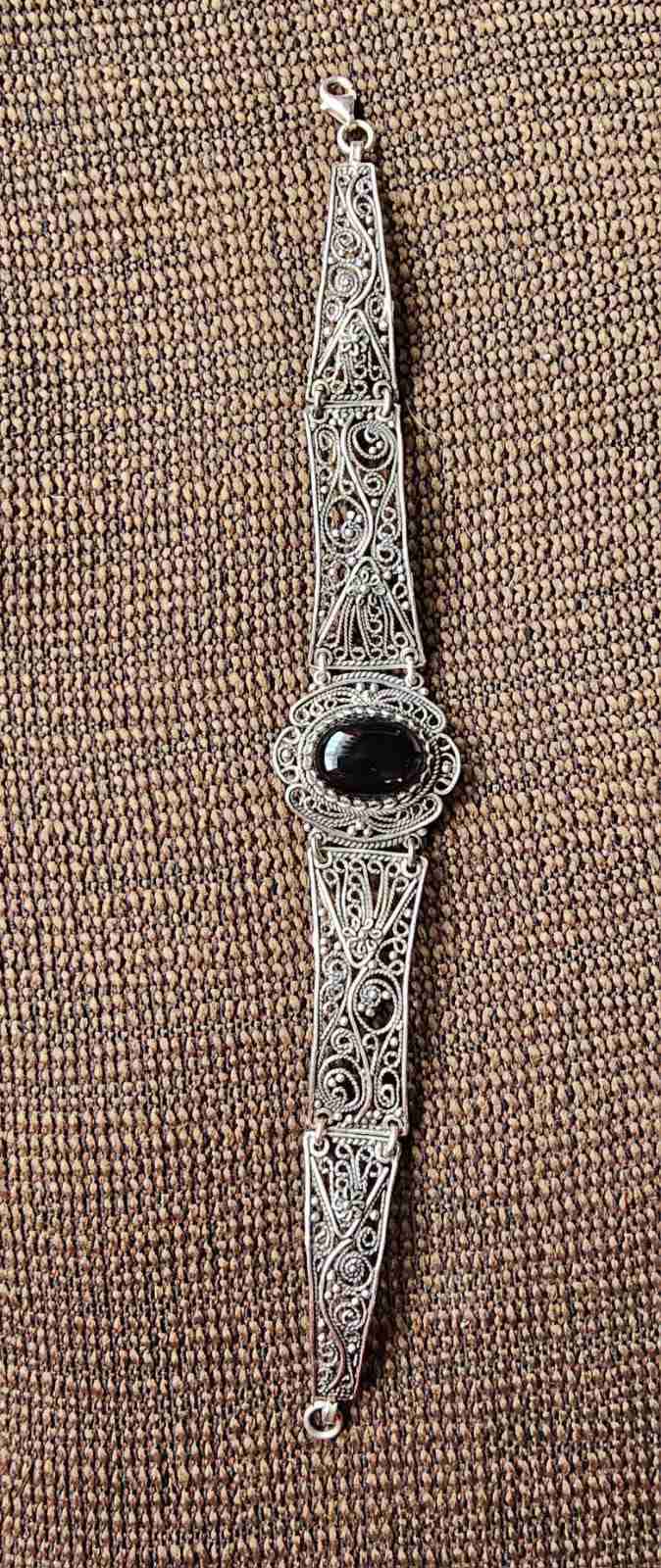 Pulsera vintage plateada con piedra - miniatura 1